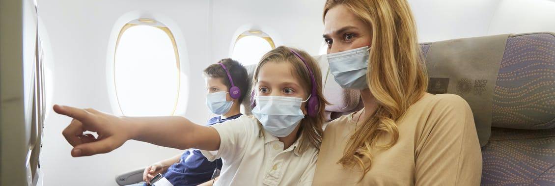 Emirates family wearing masks