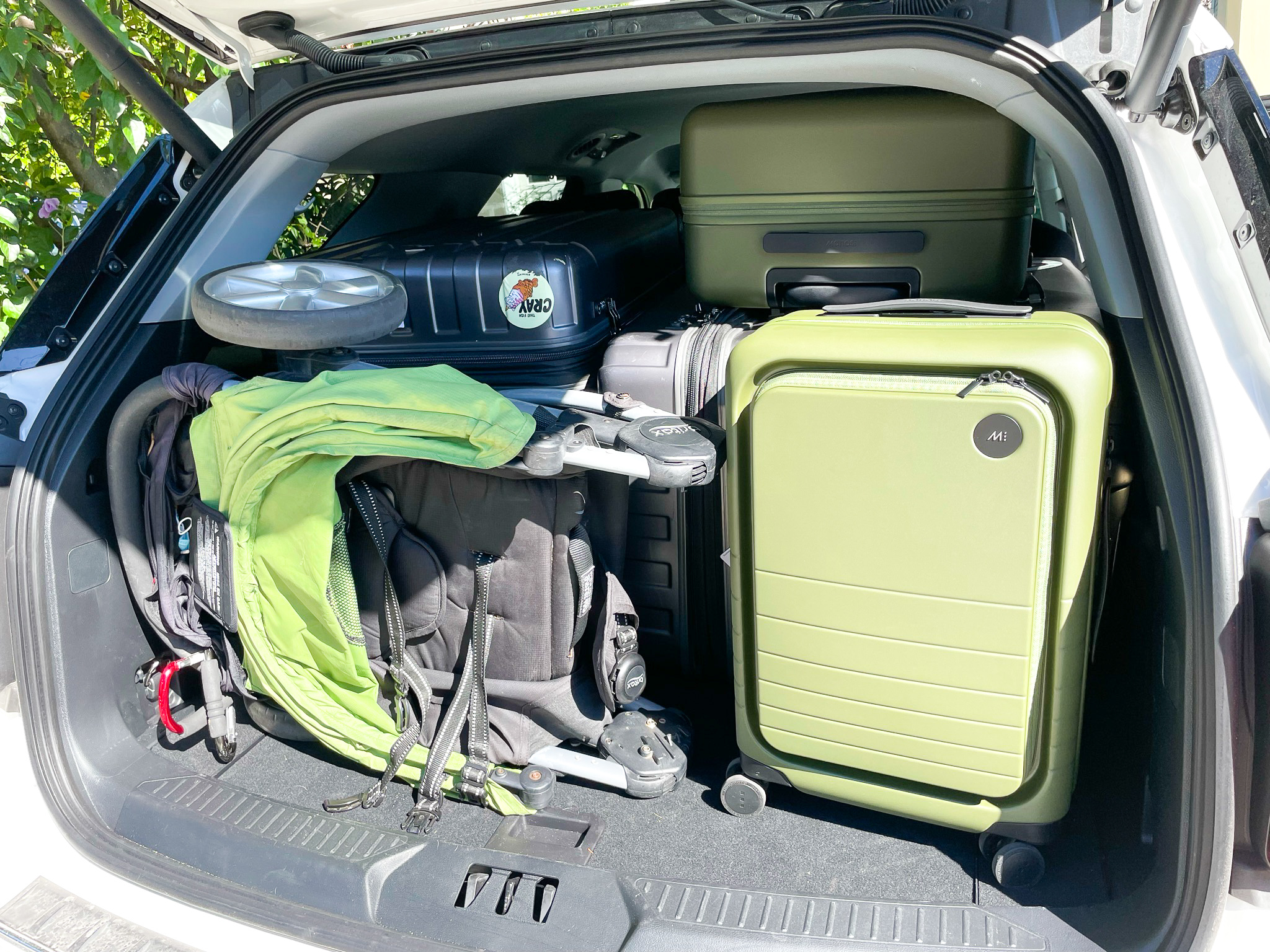 Rental Car packed with Monos luggage
