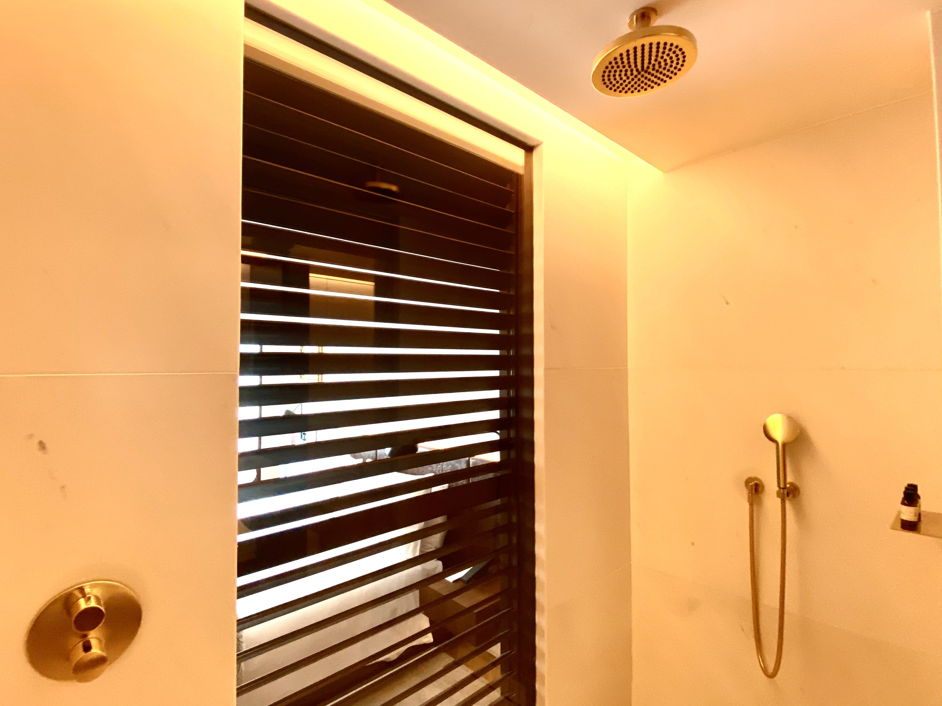 The Barcelona EDITION Deluxe Room bathroom