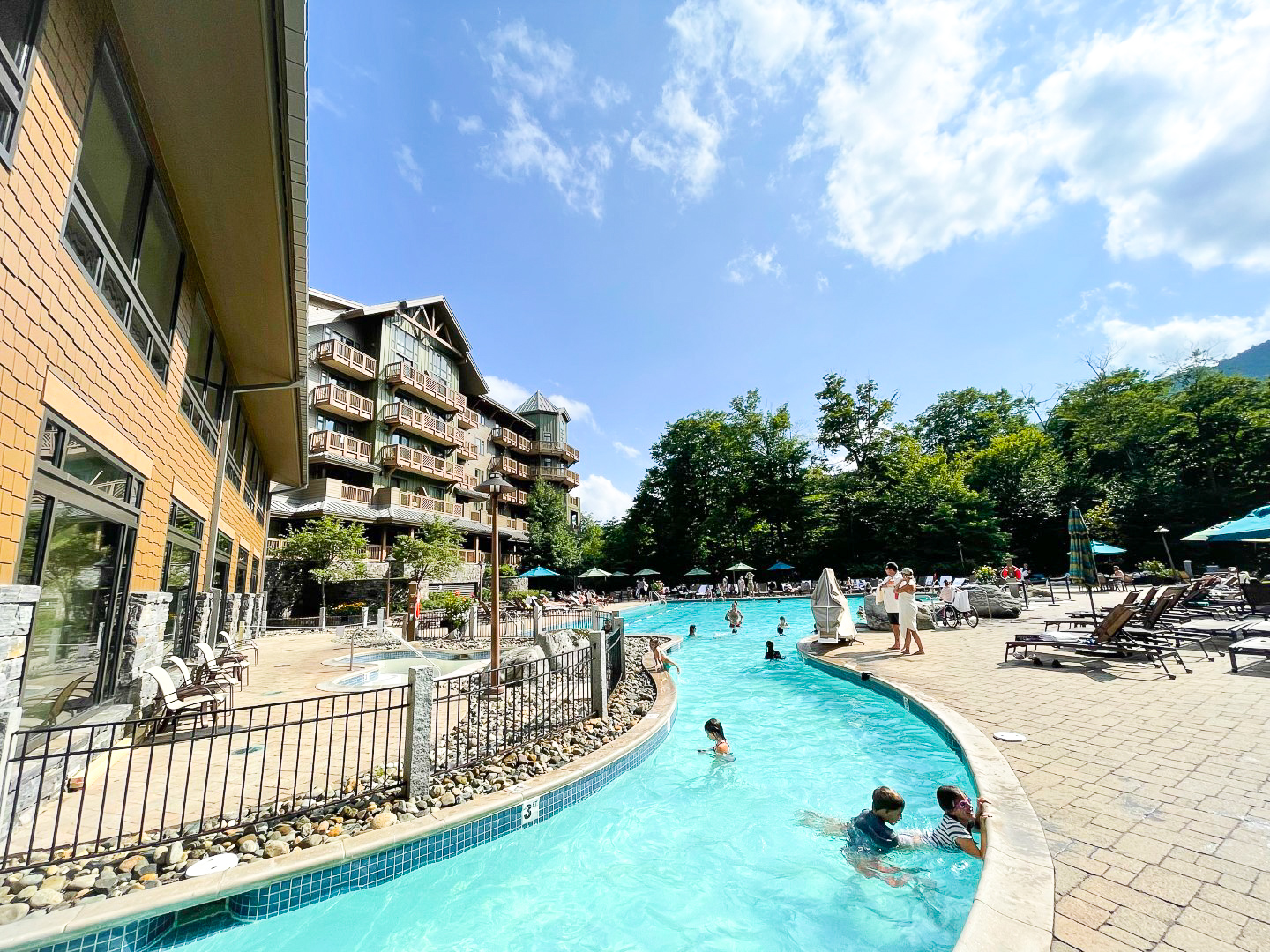 Indoor outdoor pool entrance at The Lodge at Spruce Peak Destination by Hyatt Stowe Vermont