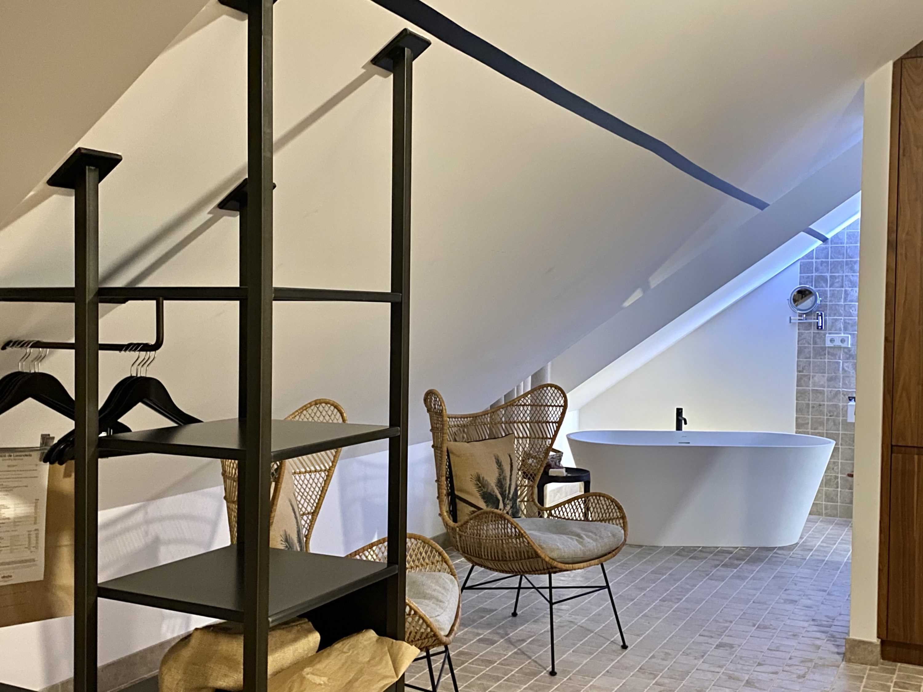 The Atocha Hotel Madrid Tapestry Collection by Hilton El Atochal Penthouse view from the bedroom into the bathroom