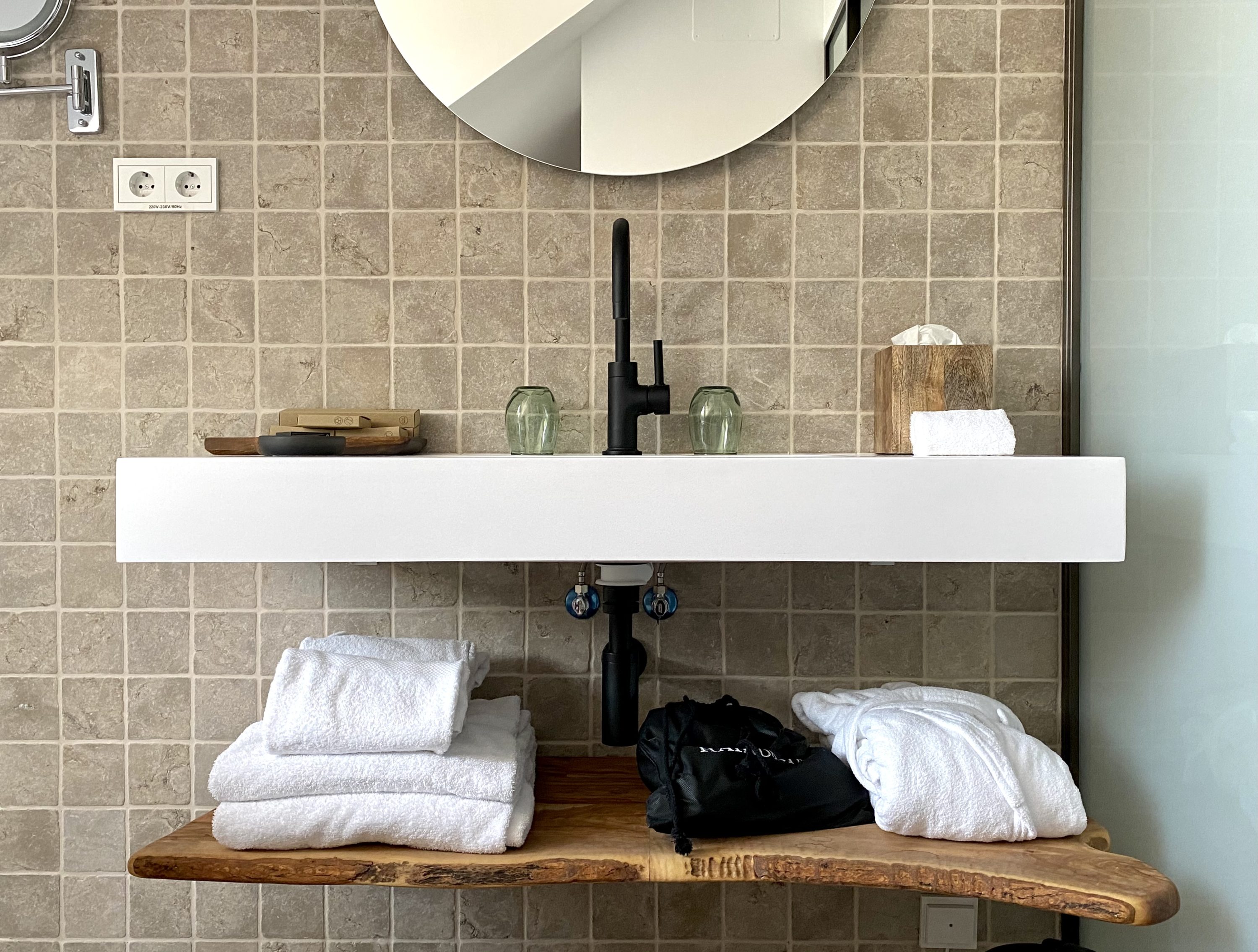 The Atocha Hotel Madrid Tapestry Collection by Hilton bathroom sink towels and robes