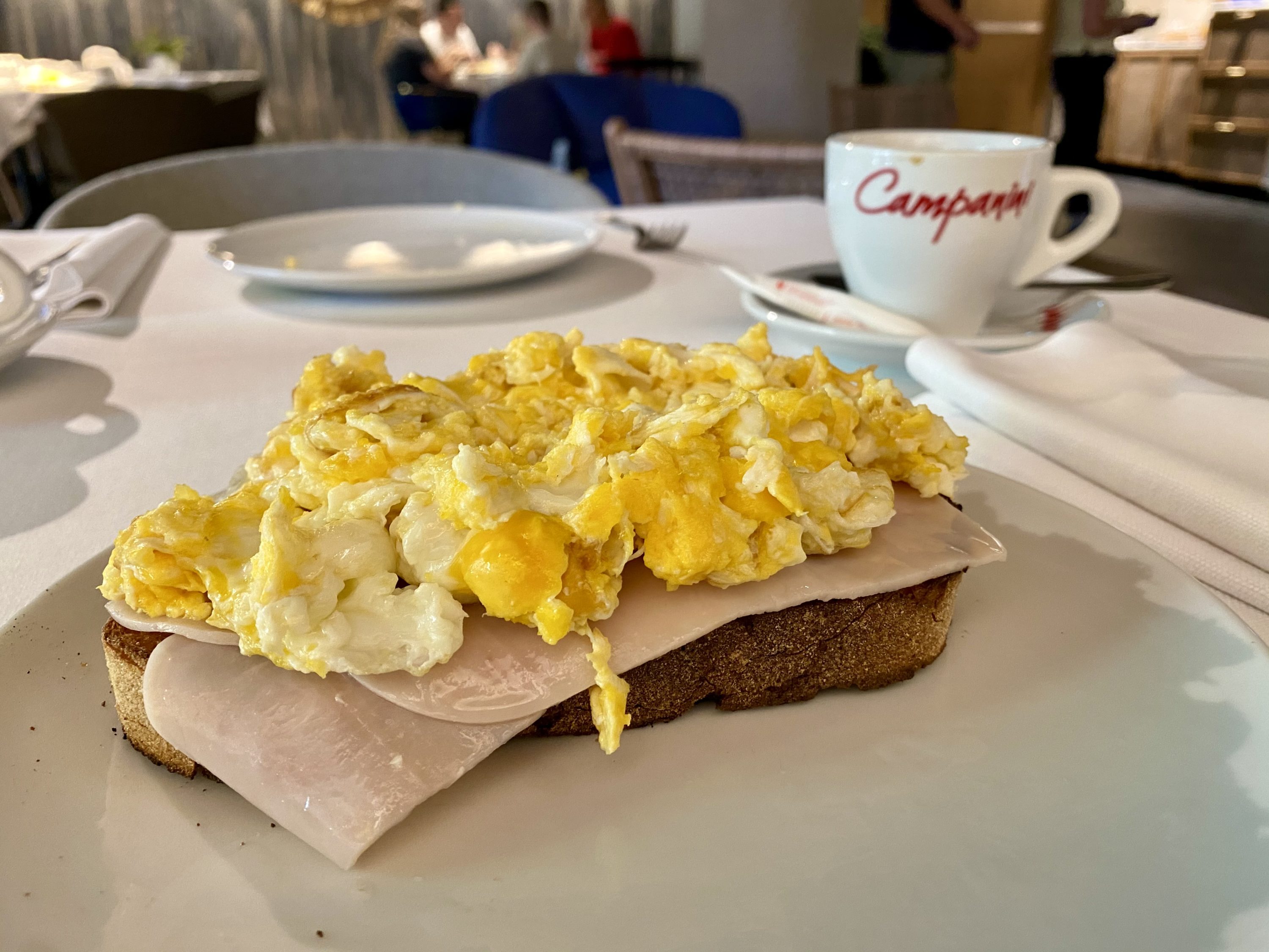 The Atocha Hotel Madrid Tapestry Collection by Hilton breakfast ham and eggs close up