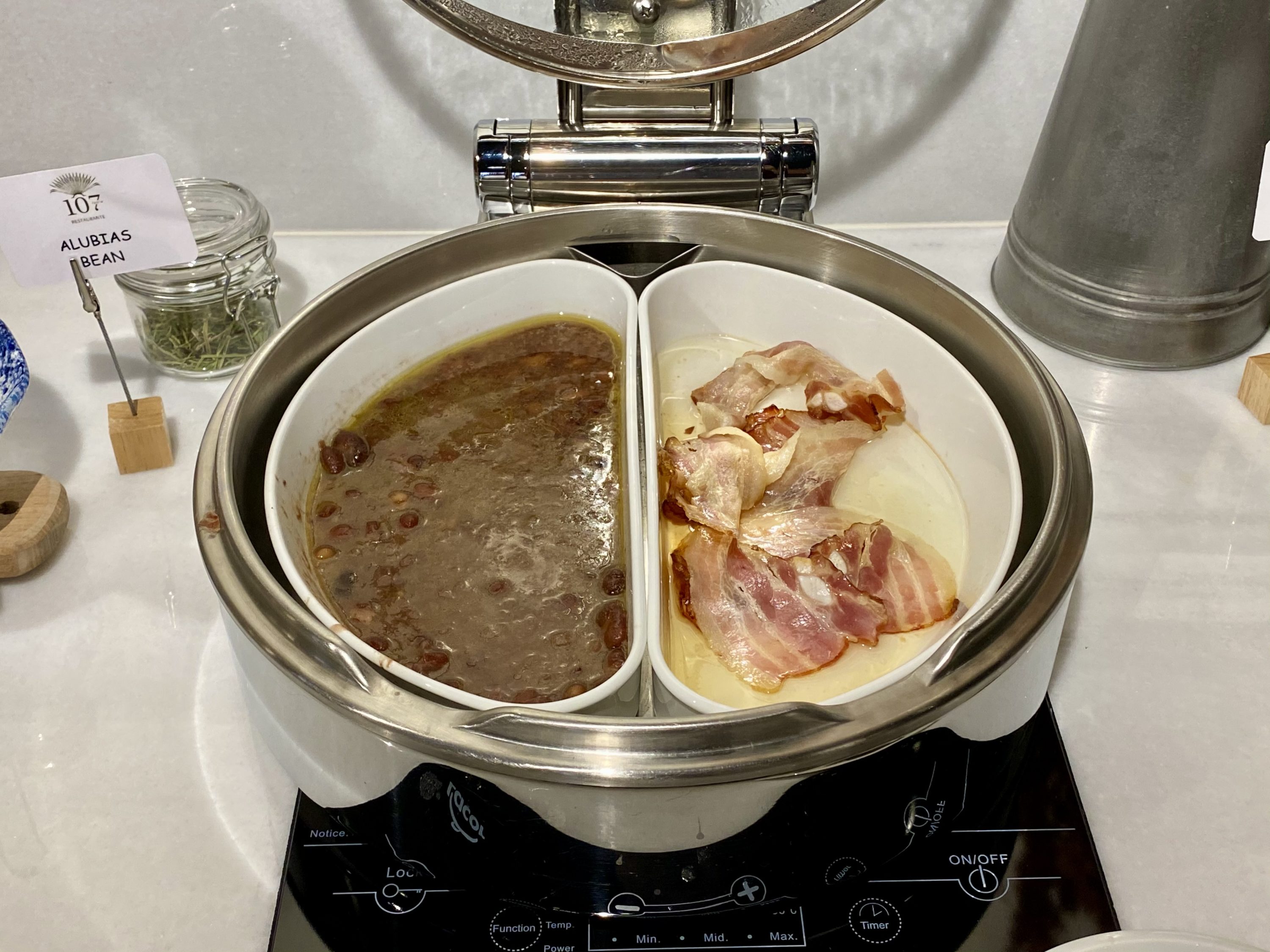 The Atocha Hotel Madrid Tapestry Collection by Hilton greasy breakfast beans and bacon