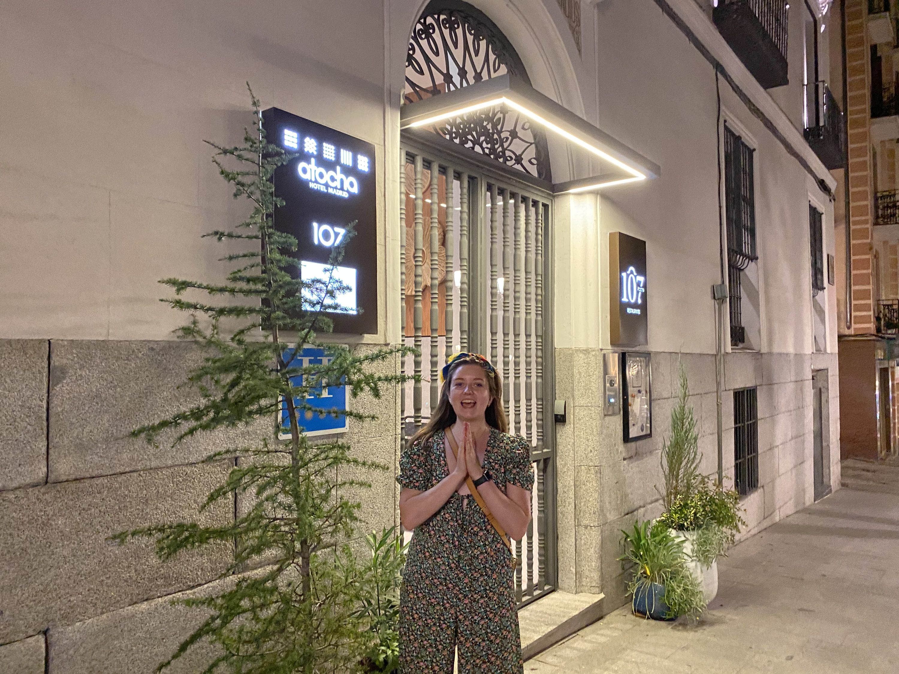 The Atocha Hotel Madrid Tapestry Collection by Hilton outside view with a very happy guest