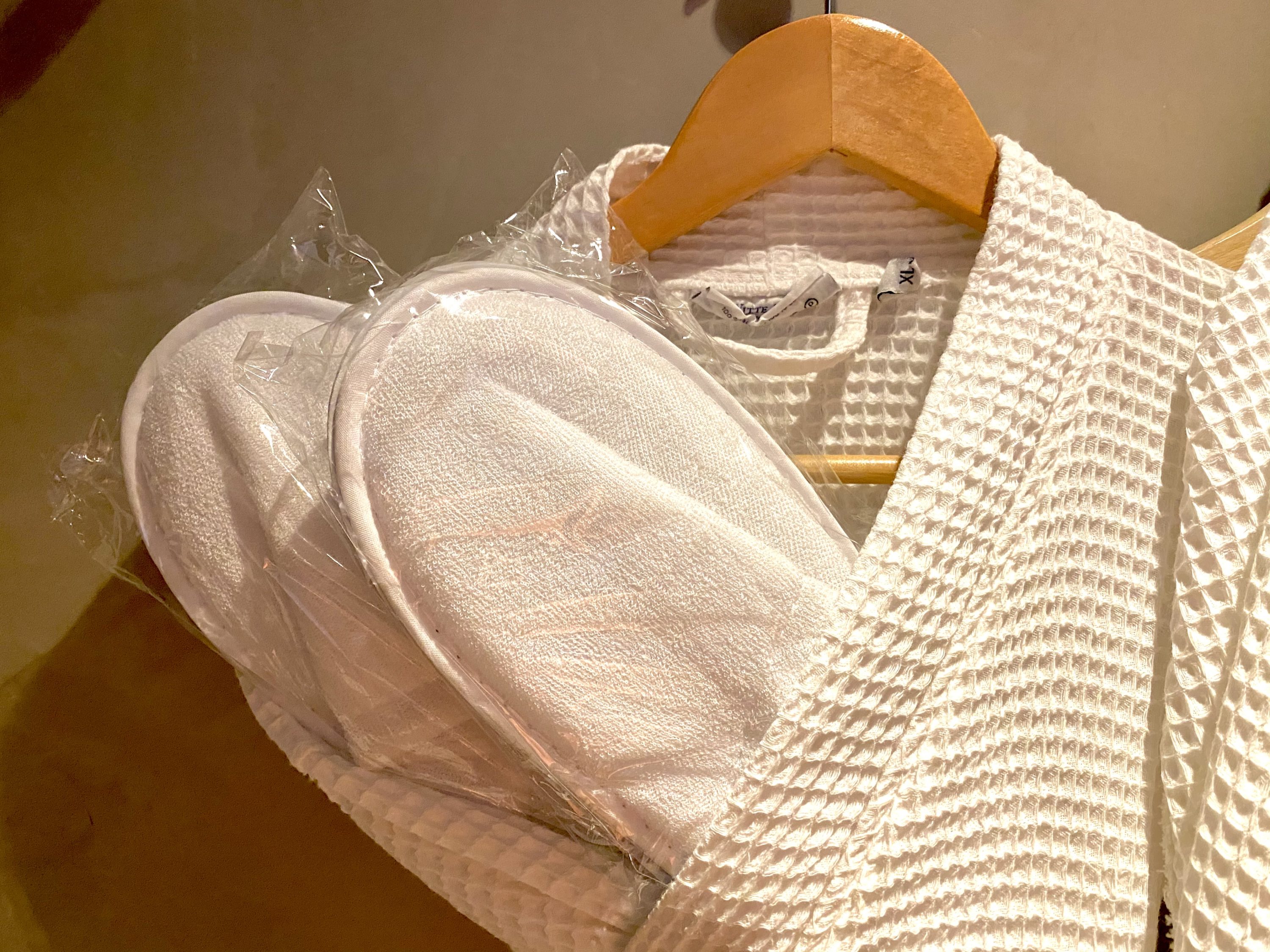 Alexandra Hotel Barcelona Curio Collection by Hilton bathroom robe and slippers