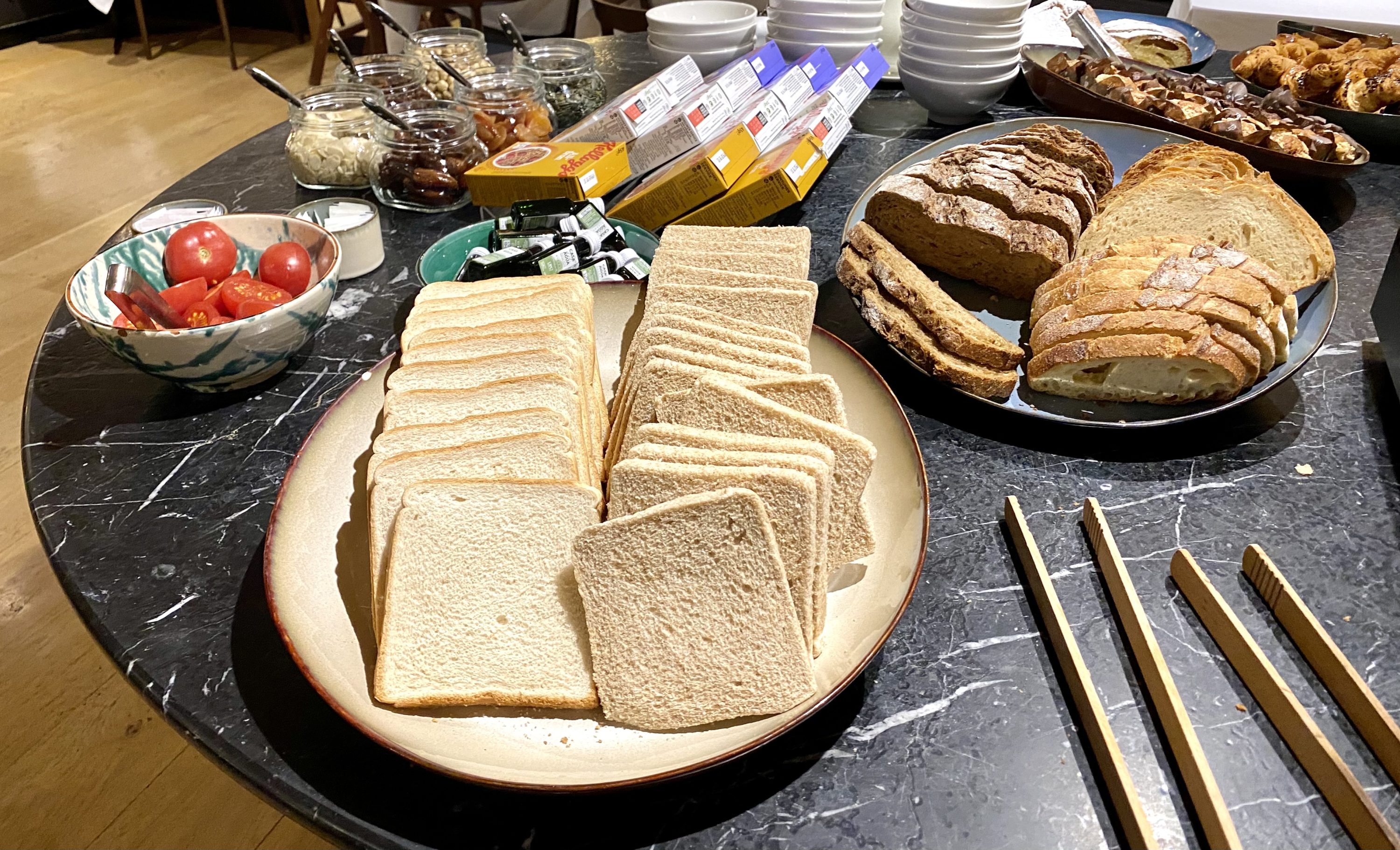 Alexandra Hotel Barcelona Curio Collection by Hilton breakfast bread selection