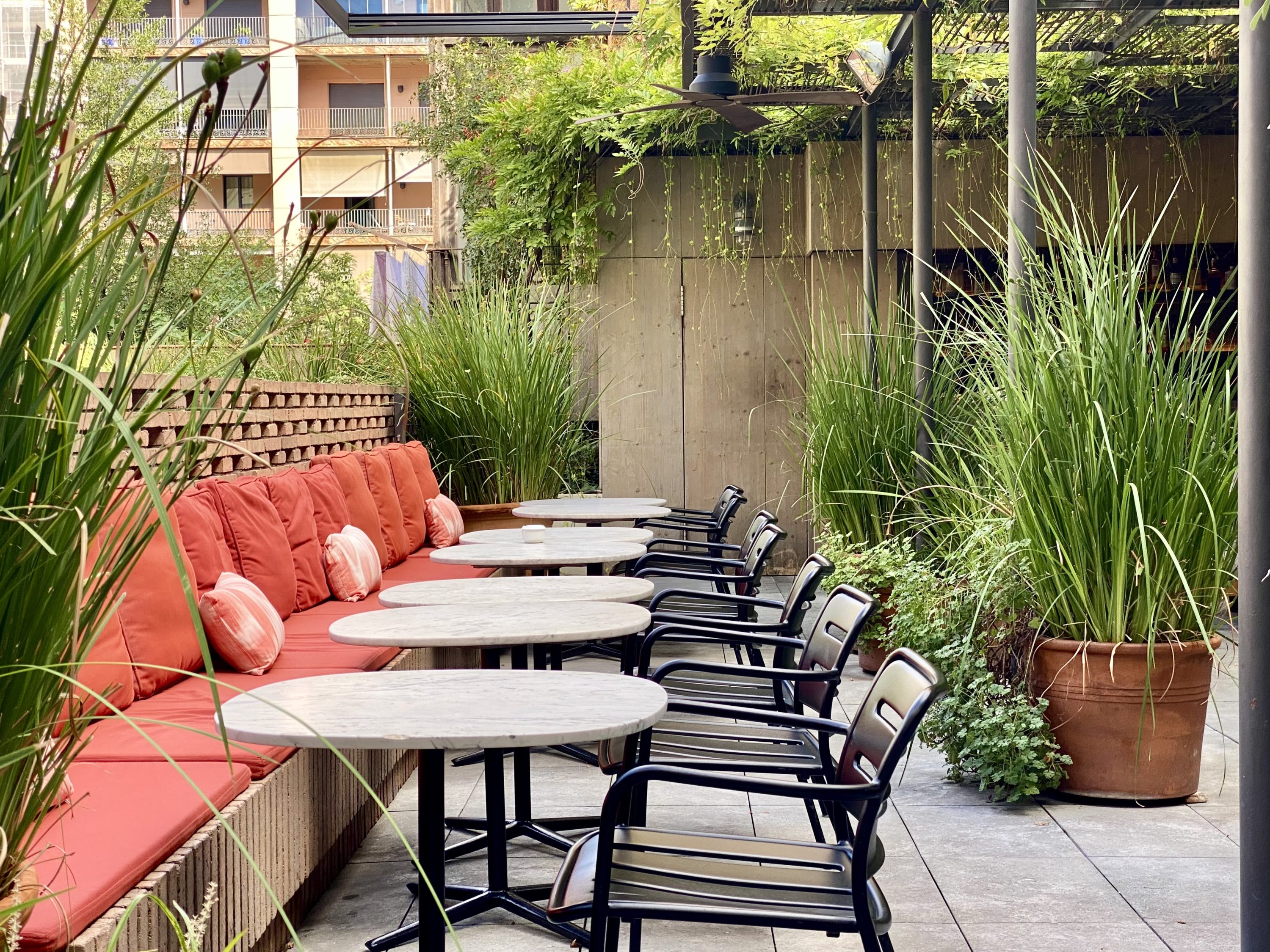 Alexandra Hotel Barcelona Curio Collection by Hilton poolside bar seating area