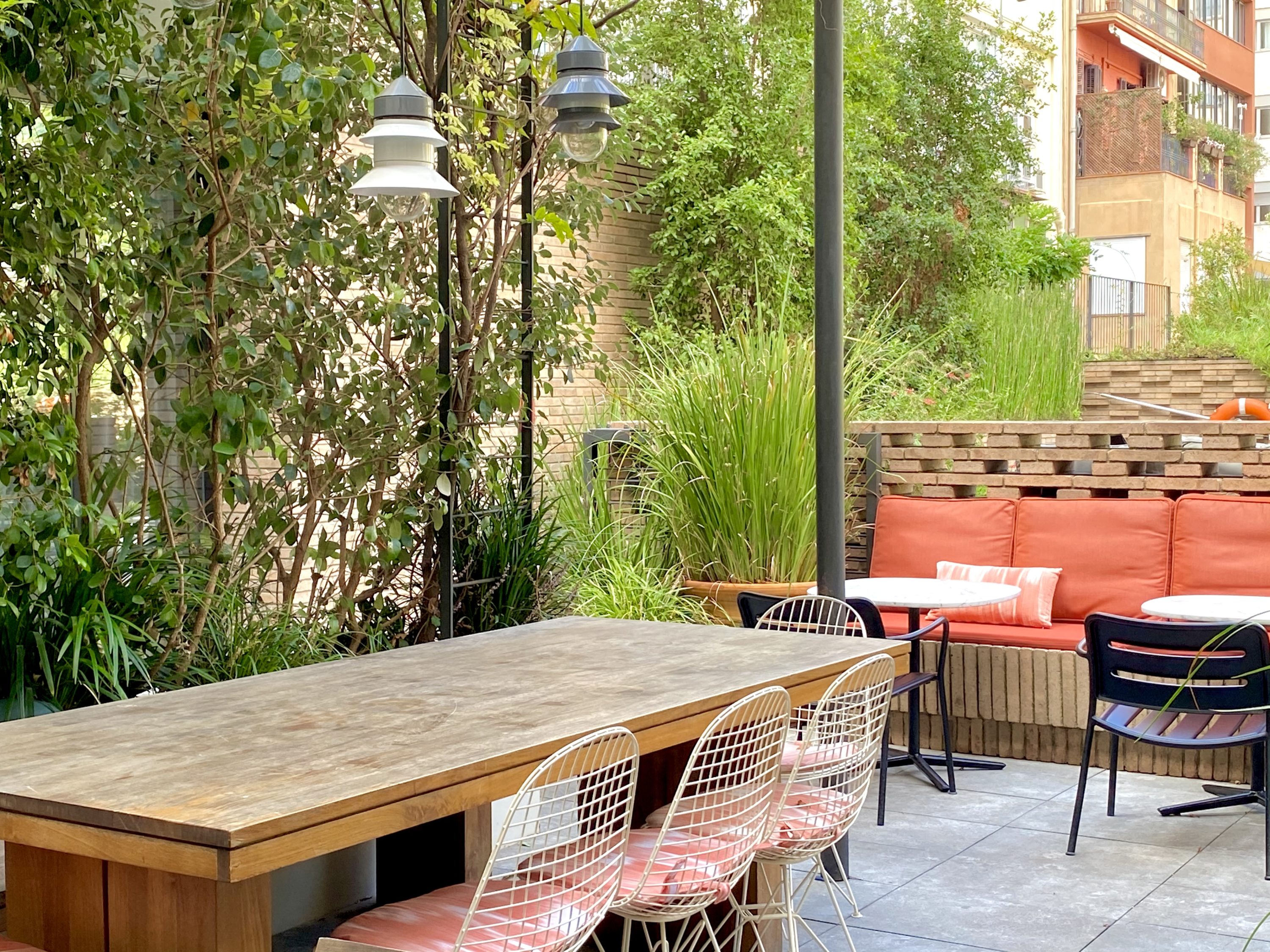 Alexandra Hotel Barcelona Curio Collection by Hilton poolside terrace seating