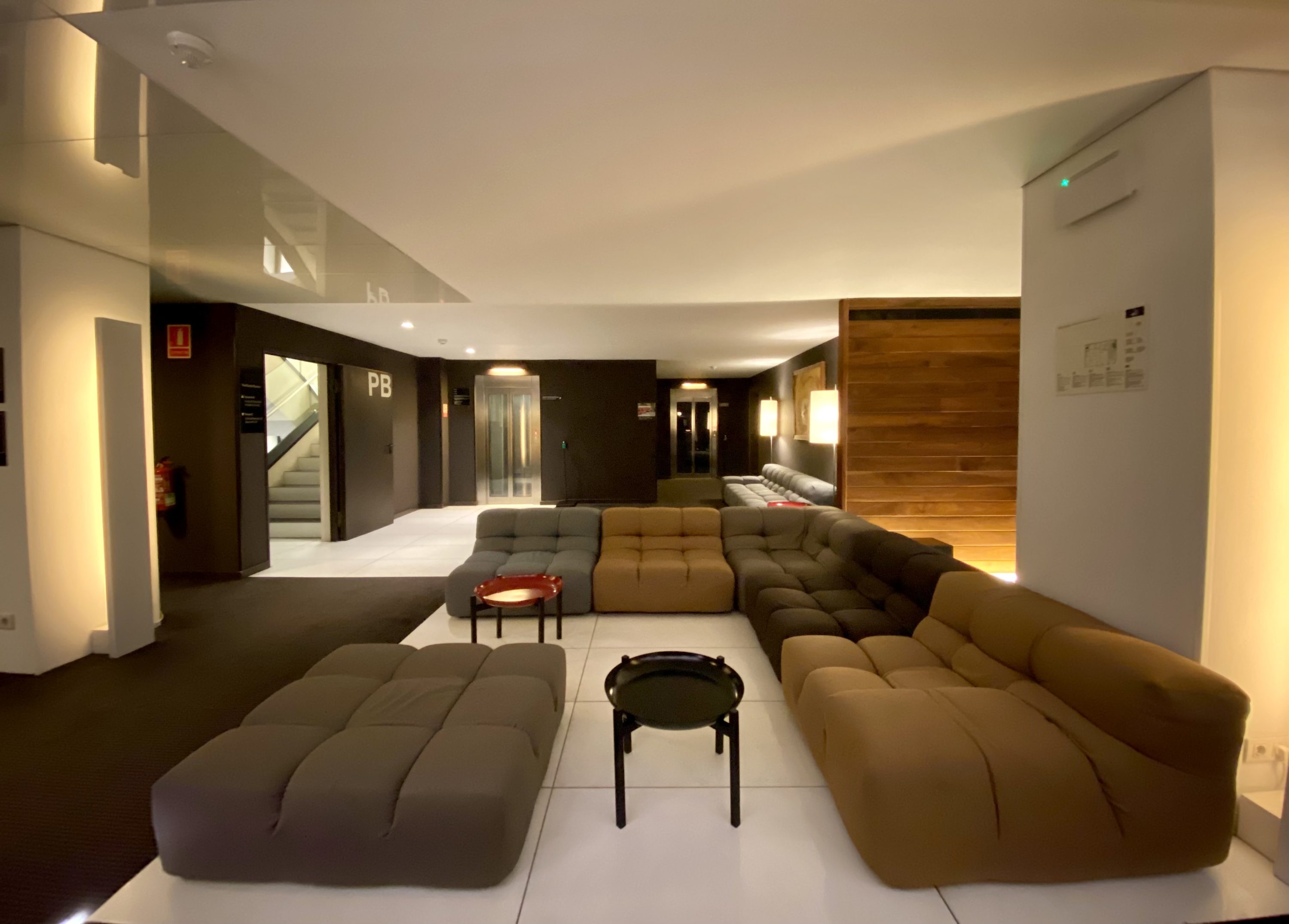 Alexandra Hotel Barcelona Curio Collection by Hilton seating area in the lobby