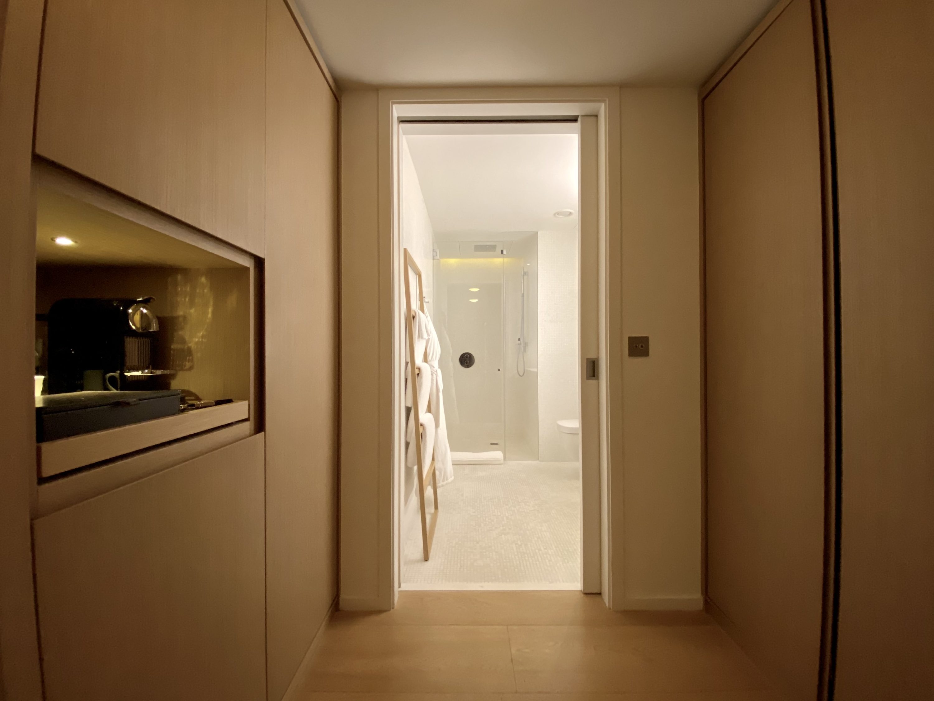 The London EDITION entrance to bathroom