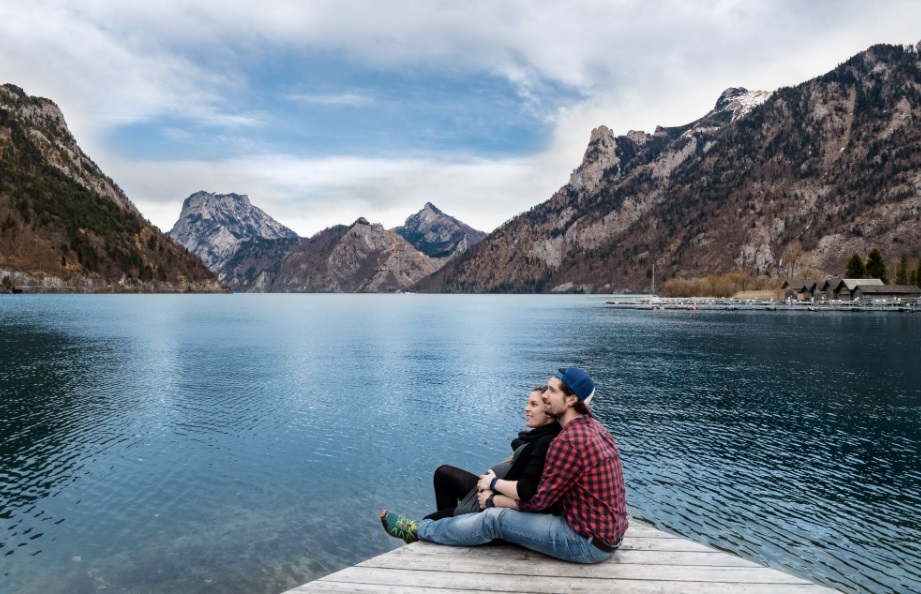 Couple sitting on dock