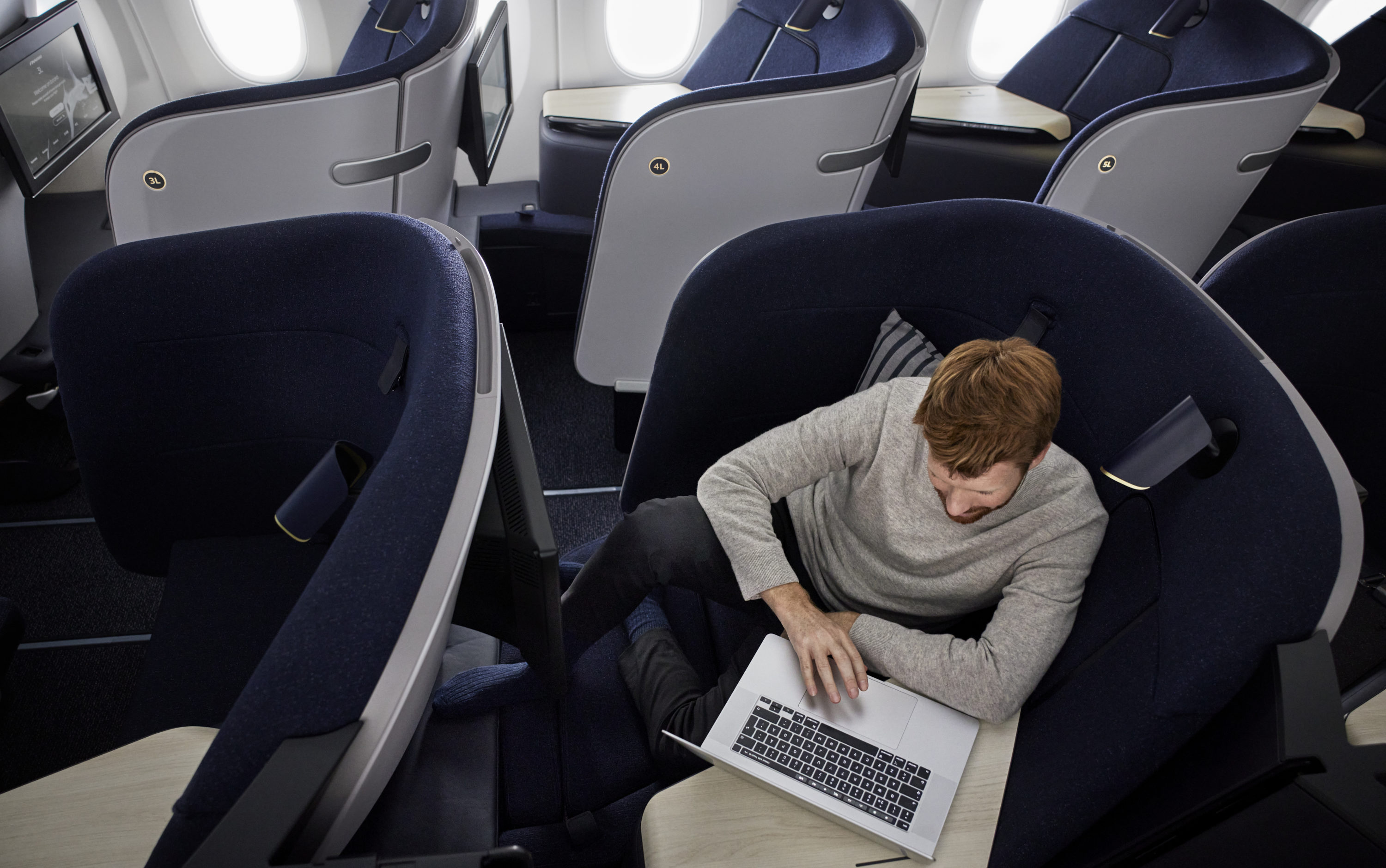 Finnair A350 Business Class Man Laptop