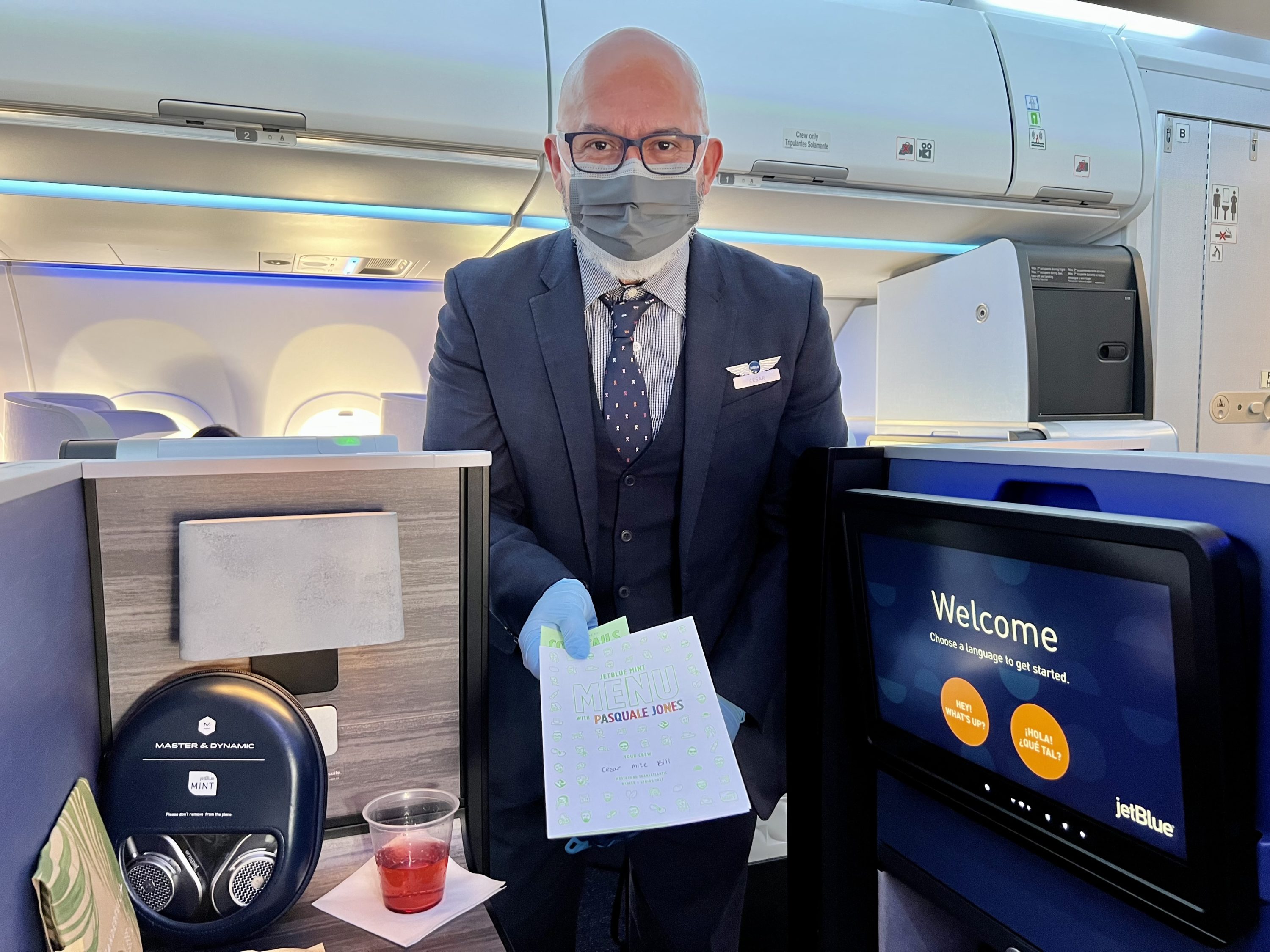JetBlue Mint A321LR crew handing out menu