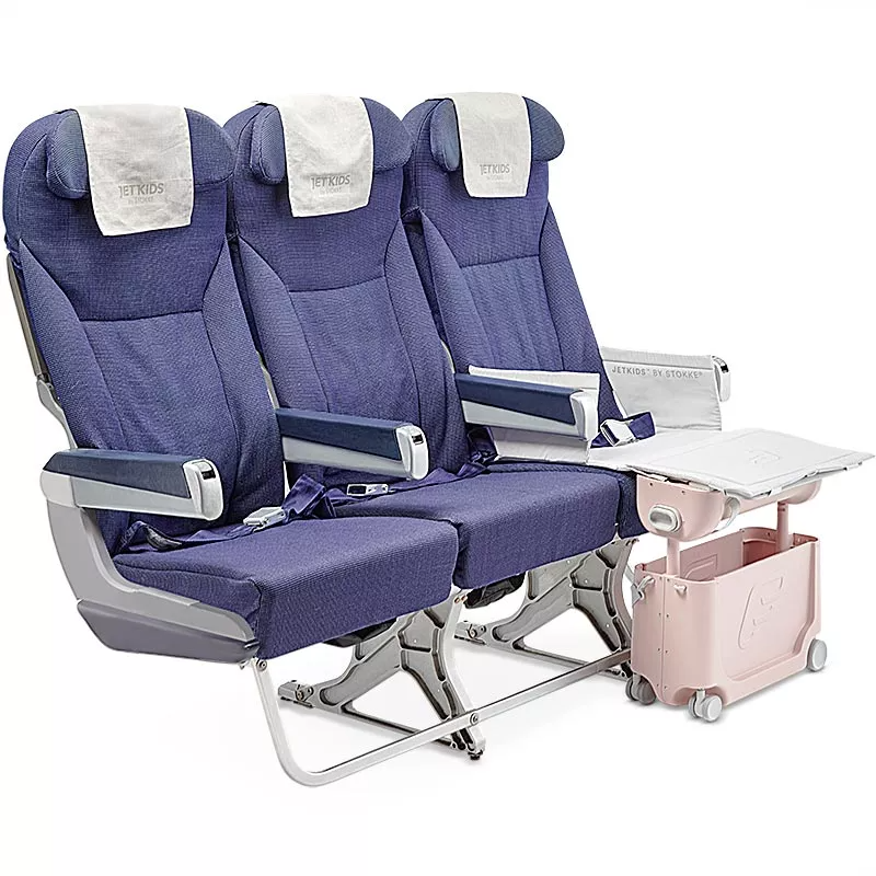 JetKids BedBox bag at airplane seat