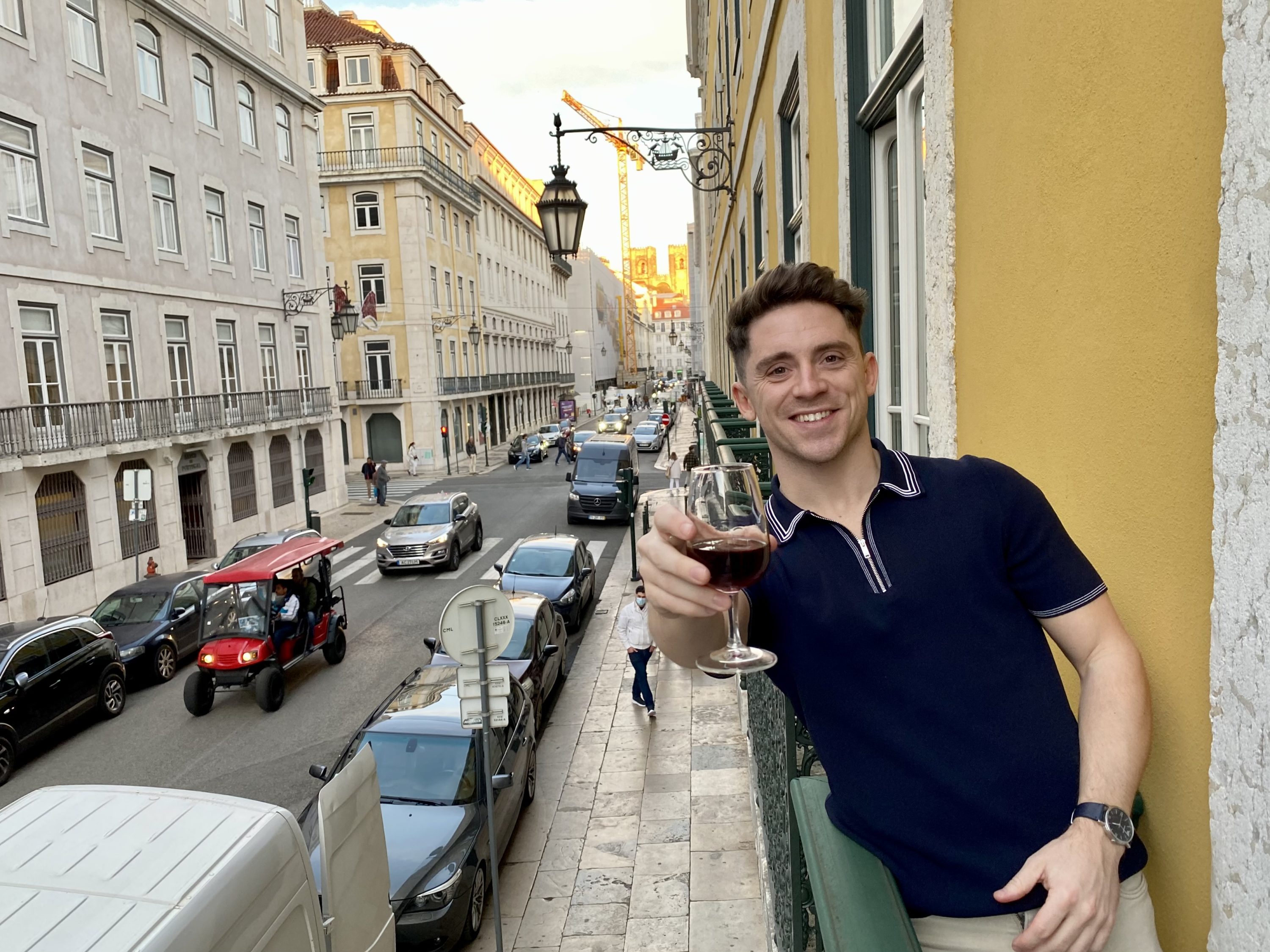 Pousada de Lisboa Small Luxury Hotels of the World bedroom balcony with Port cheers