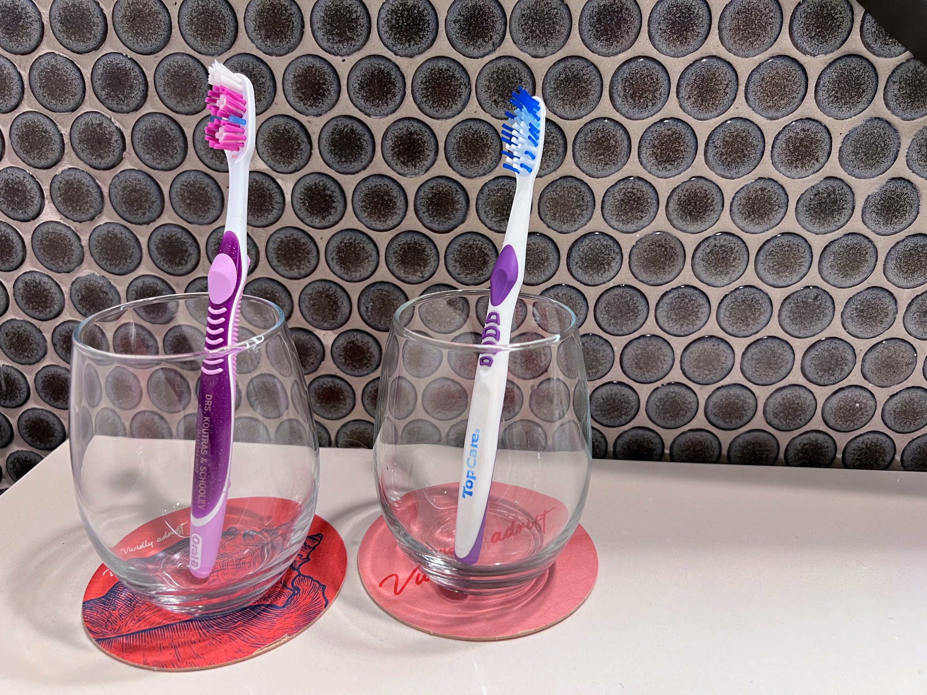 Use glasses as toothbrush holders