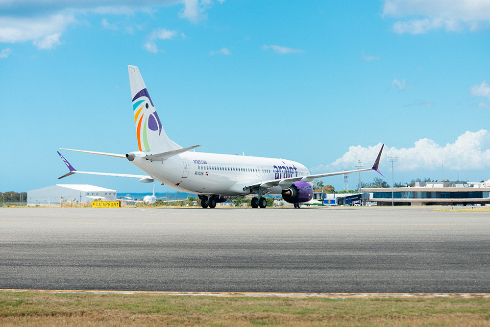 Arajet jet parked at an airport