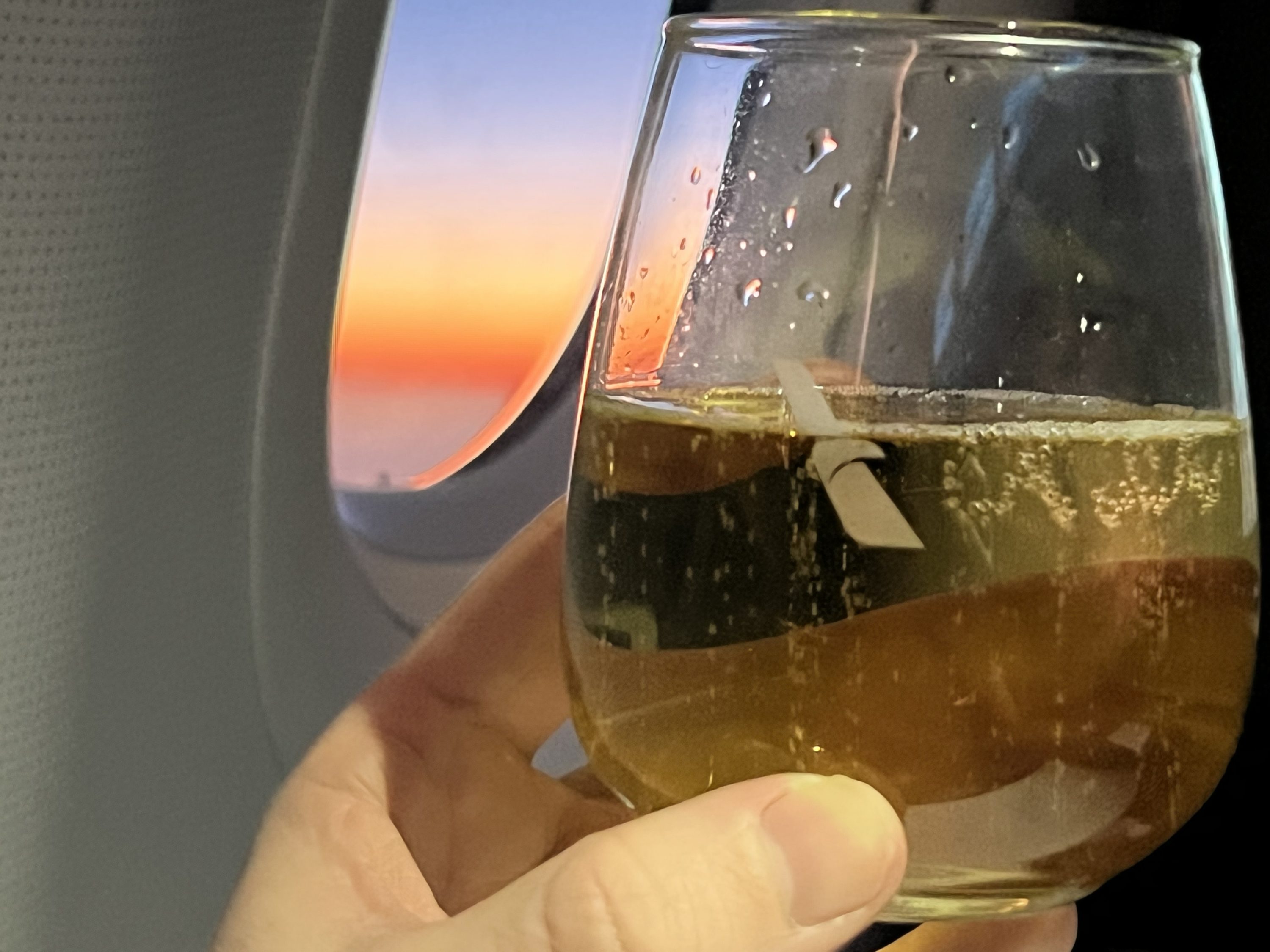 American Airlines A321T Flagship Business FF Champagne and sunset