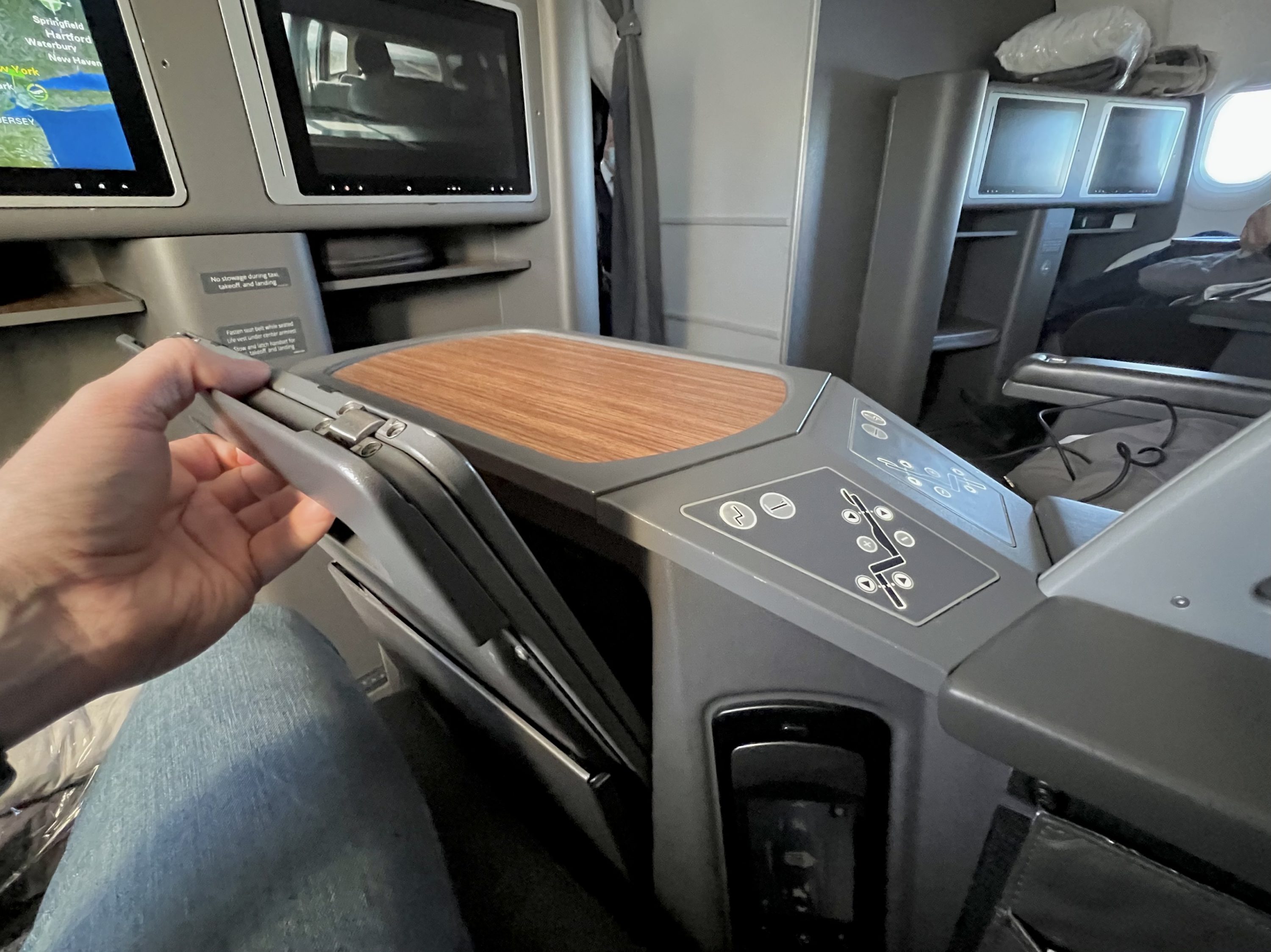 American Airlines A321T Flagship Business seat tray table compartment