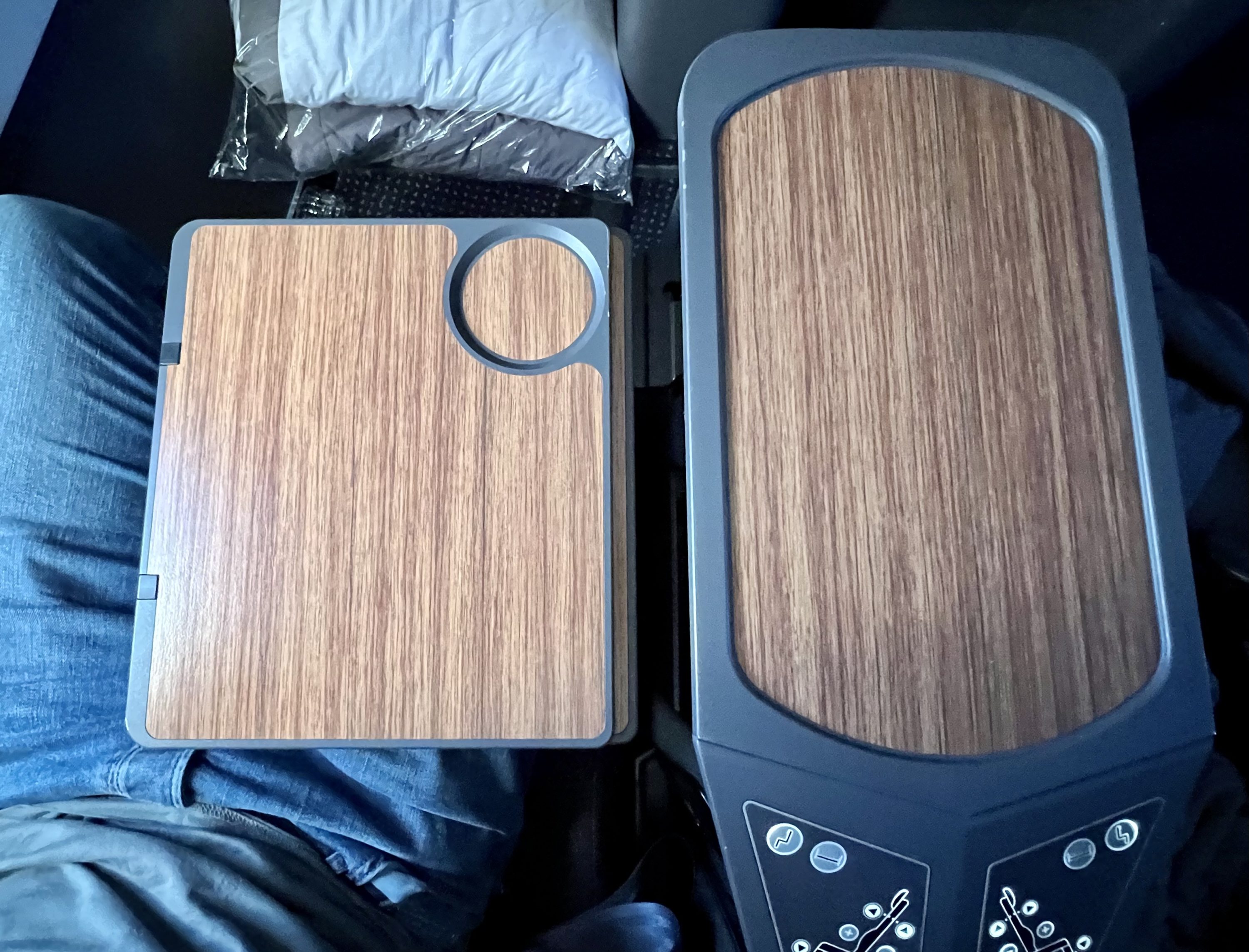 American Airlines A321T Flagship Business seat tray table half extended