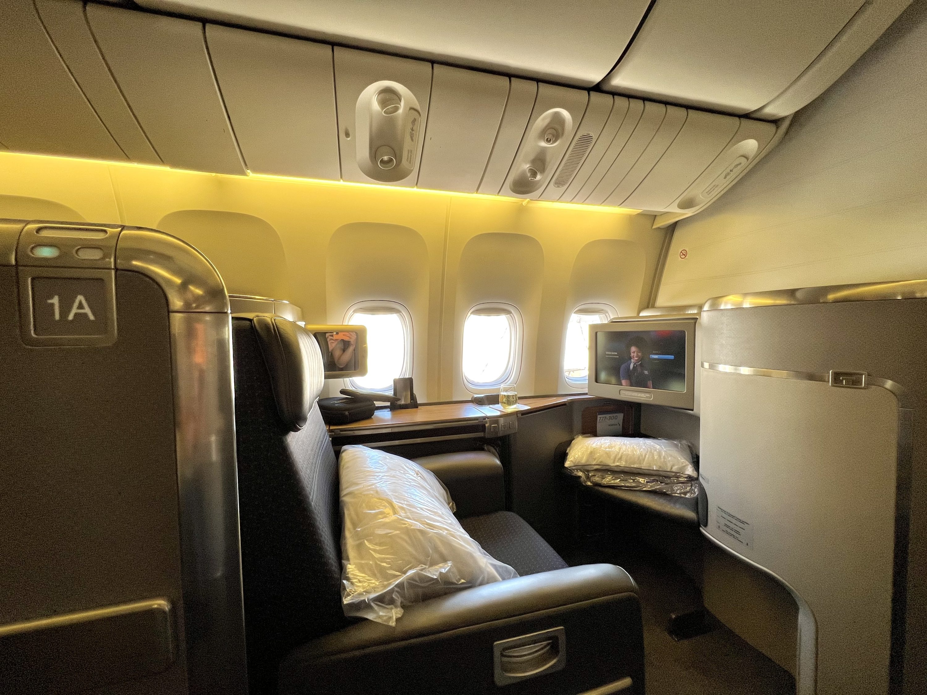 American Airlines Boeing 777 300 Flagship First seat 1A on boarding