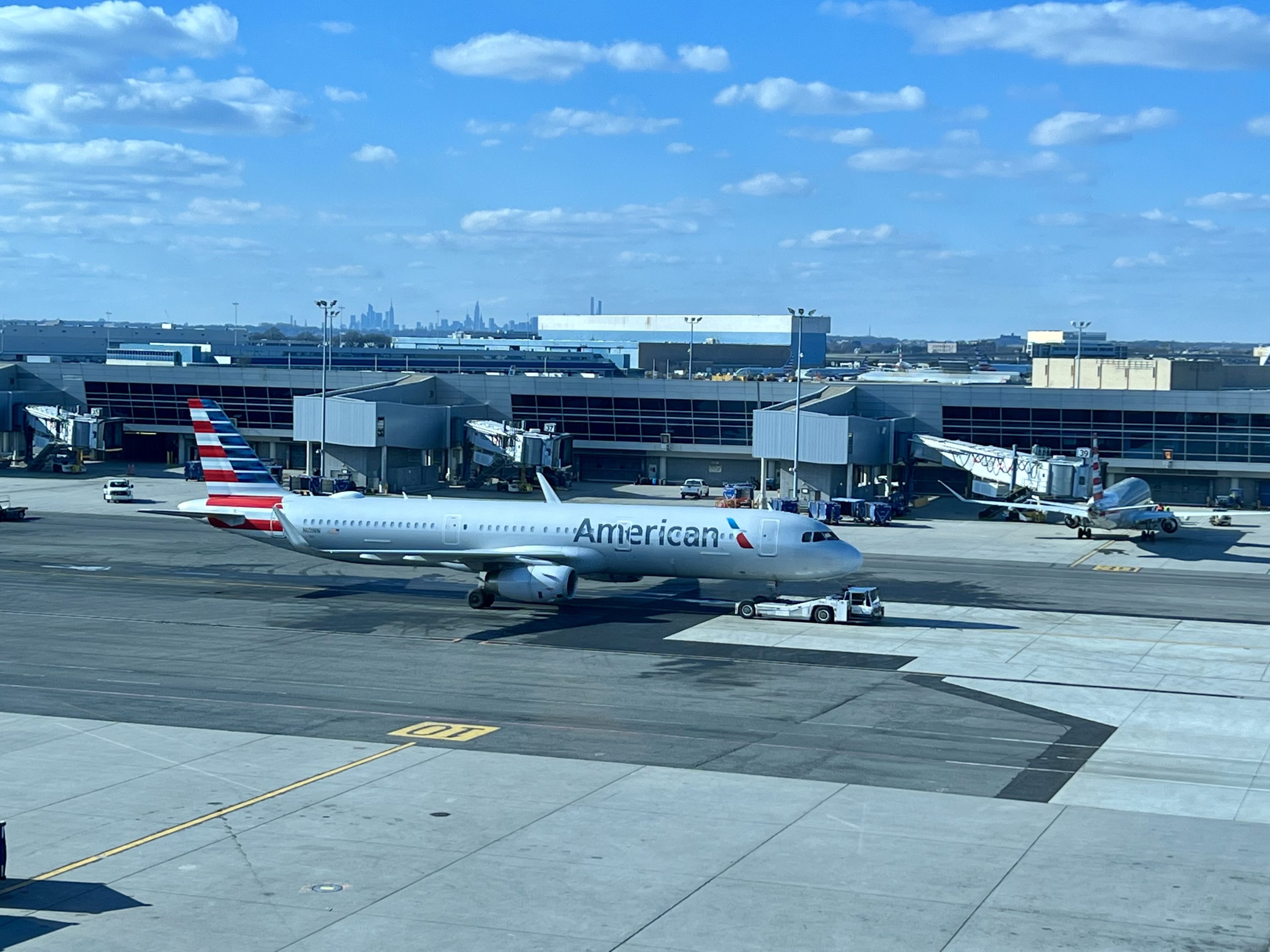 American Airlines Flagship Business JFK A321T arrival on stand