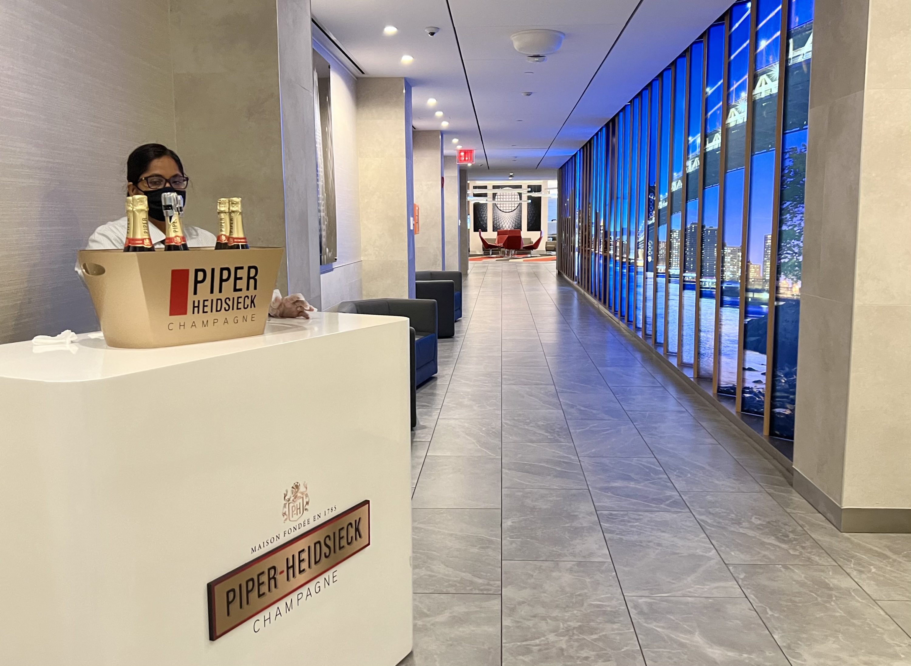 American Airlines Flagship Business JFK Flagship Lounge Champagne on arrival