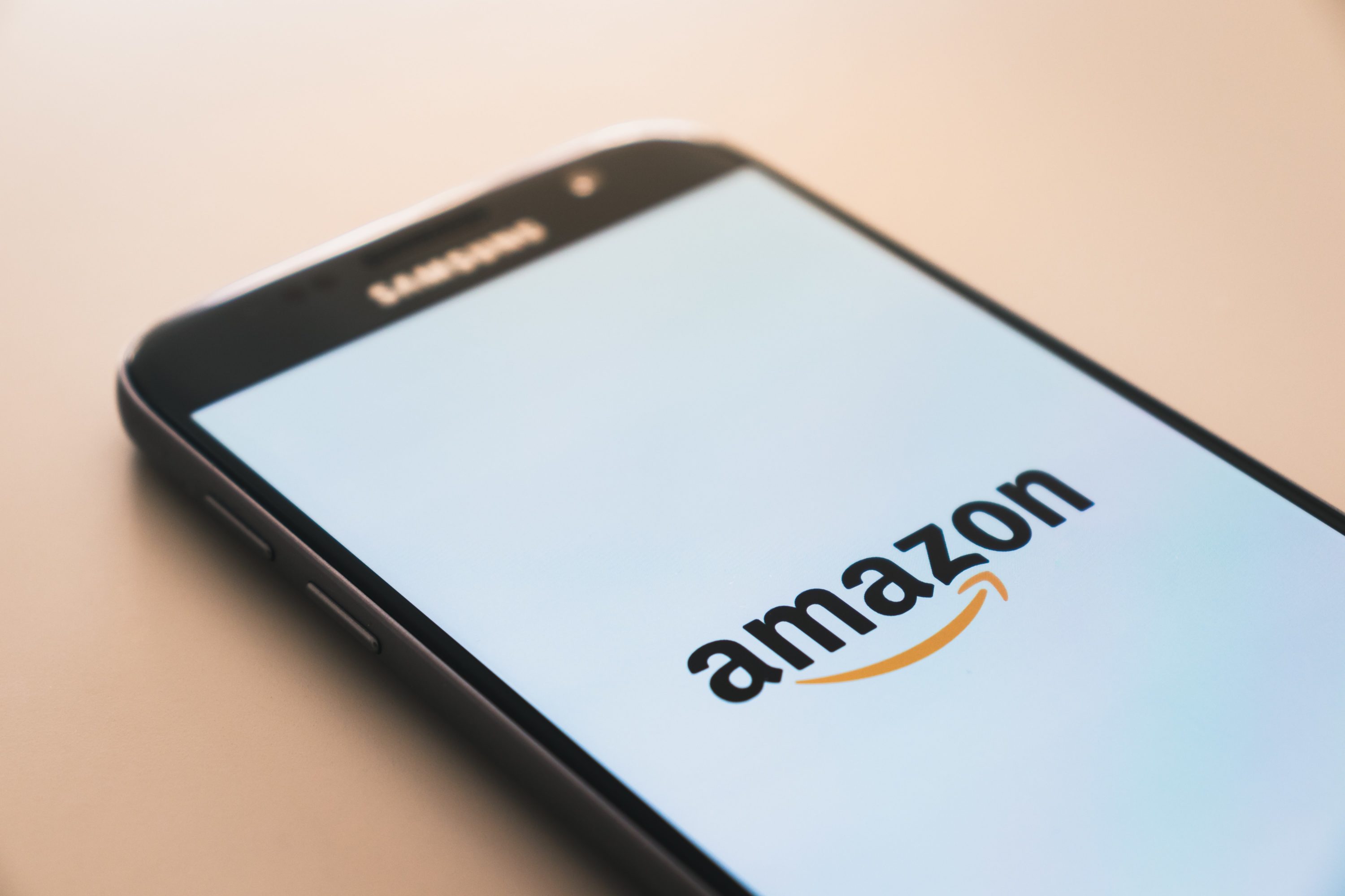 Amazon logo on phone via Christian Wiediger/Unsplash Amazon logo on phone via Christian Wiediger/Unsplash