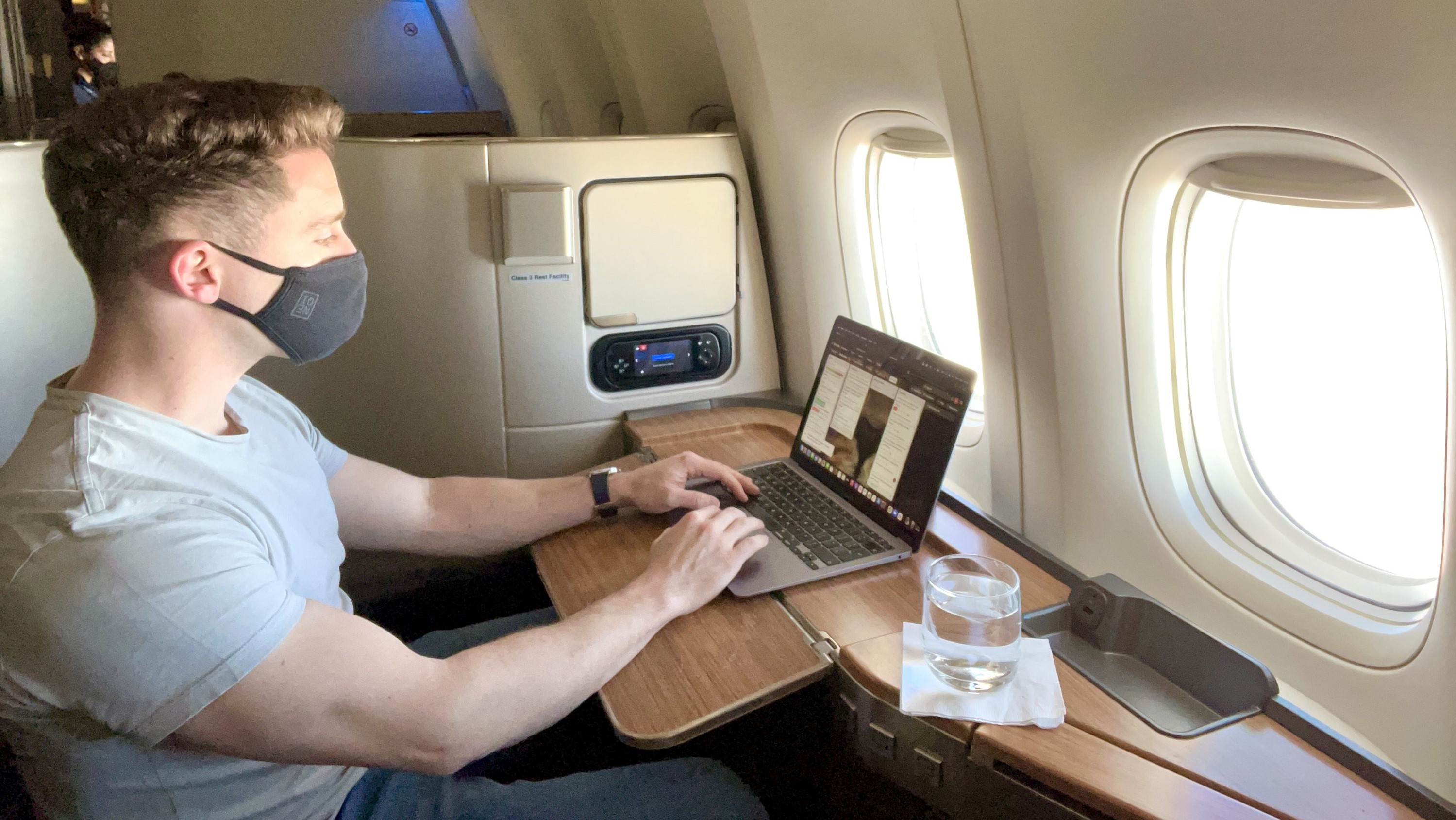 American Airlines Boeing 777 300 Flagship First working on laptop from seat 1A