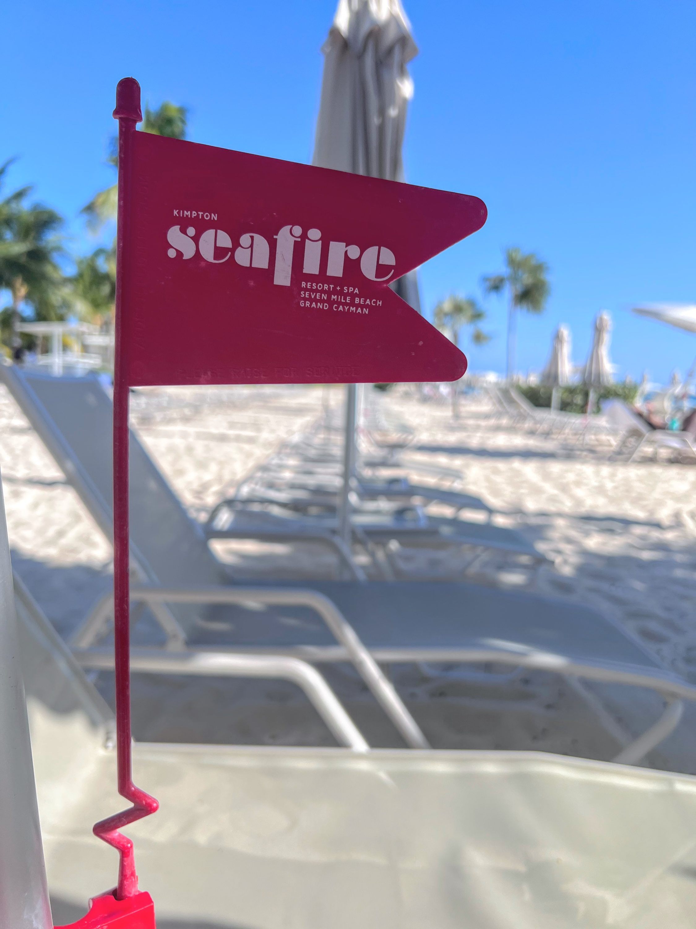 Beach chair flags at Kimpton Seafire