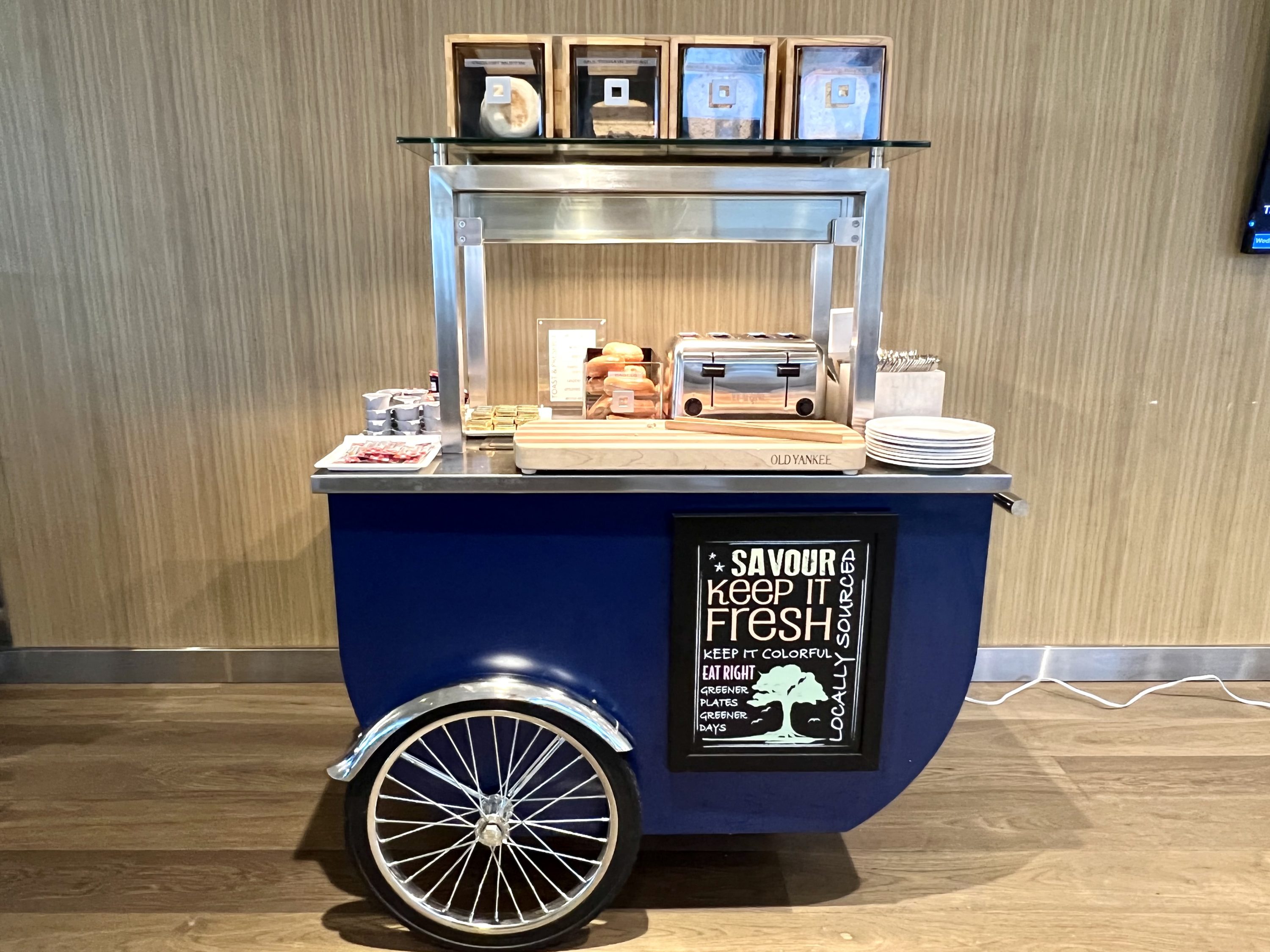 British Airways Boeing 777 300 Club Suite JFK Galleries Lounge toast and bagel cart