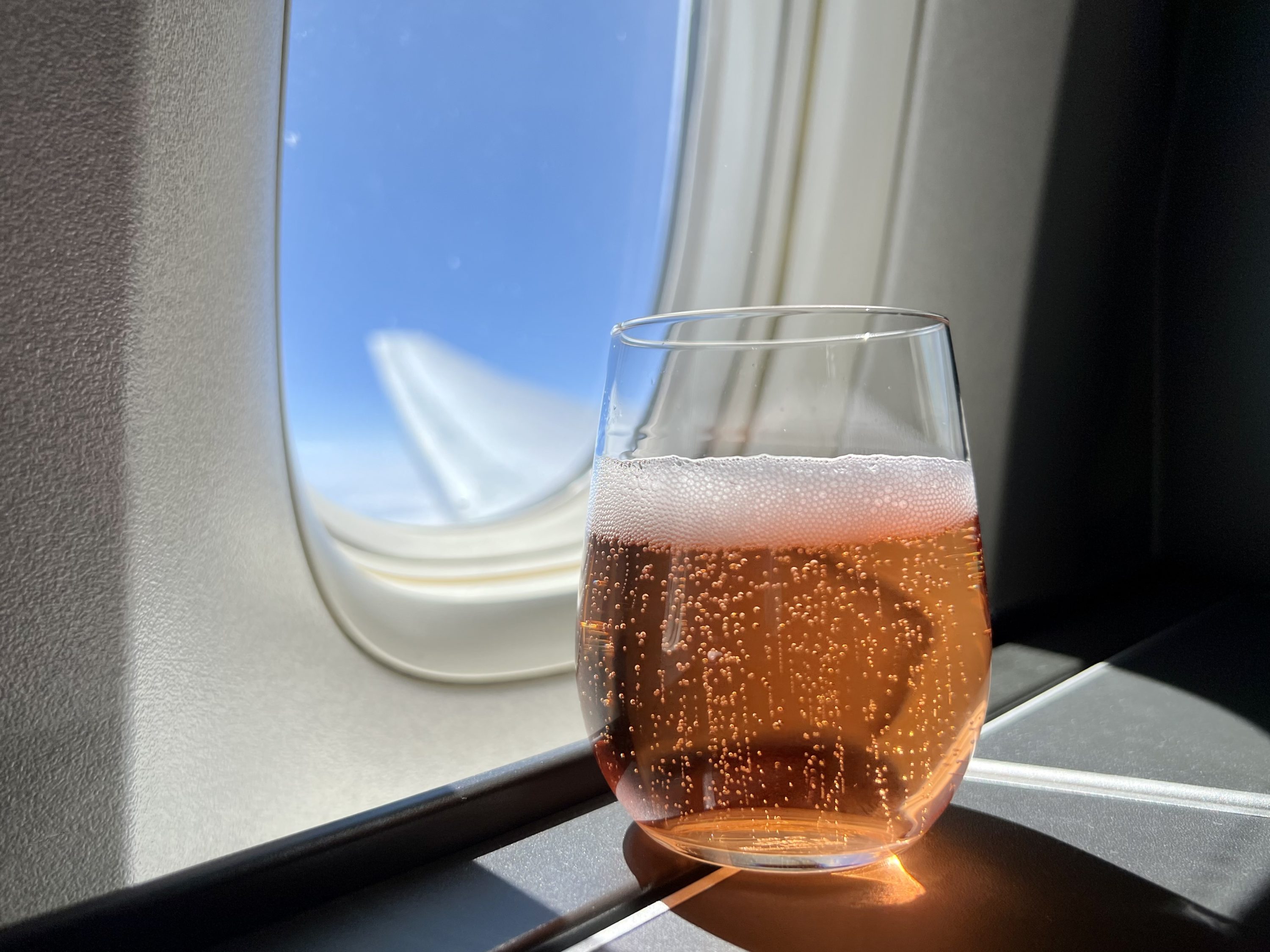 British Airways Boeing 777 300 Club Suite fb Champagne and wingtip