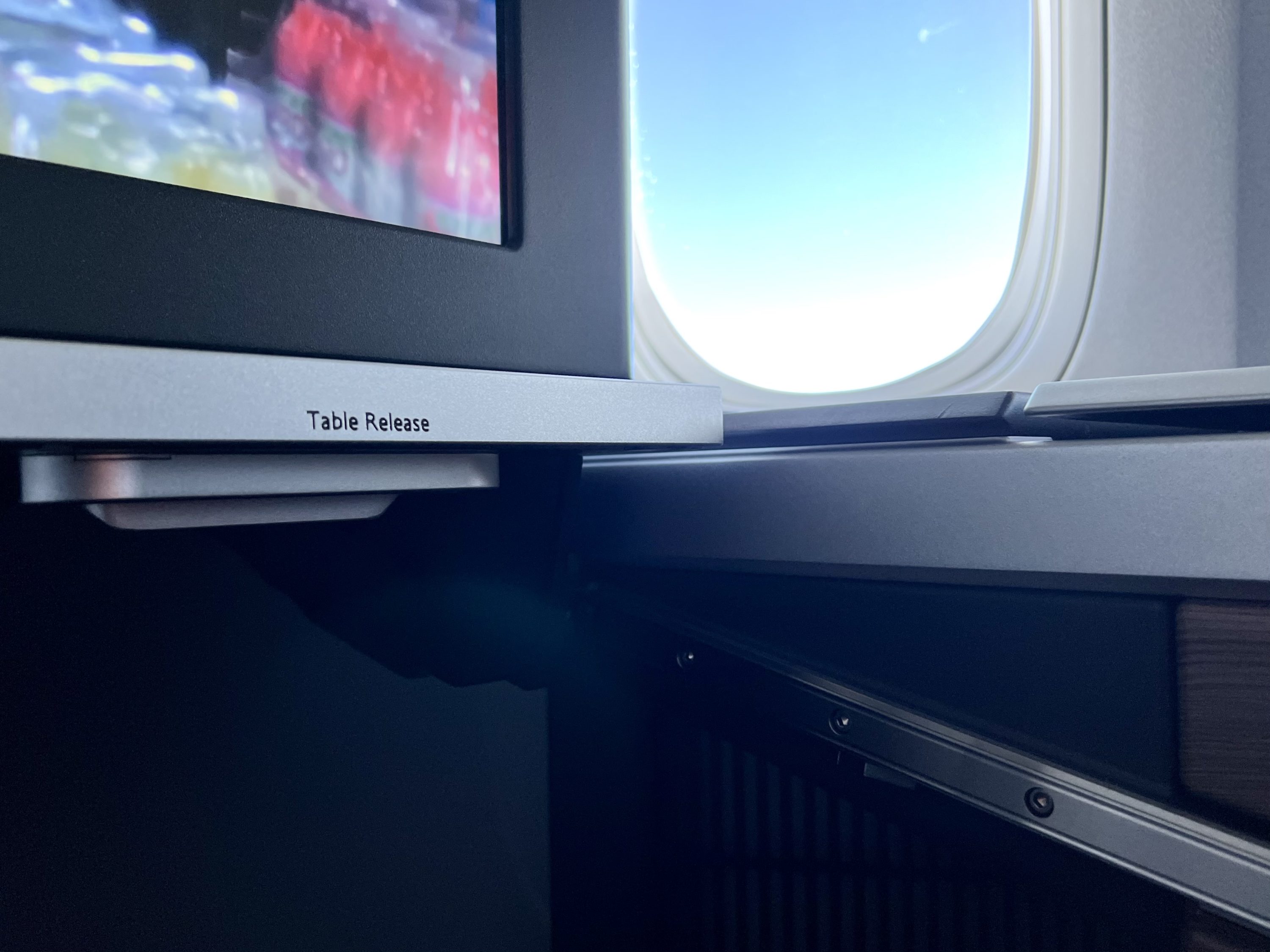 British Airways Boeing 777 300 Club Suite seat table release close-up