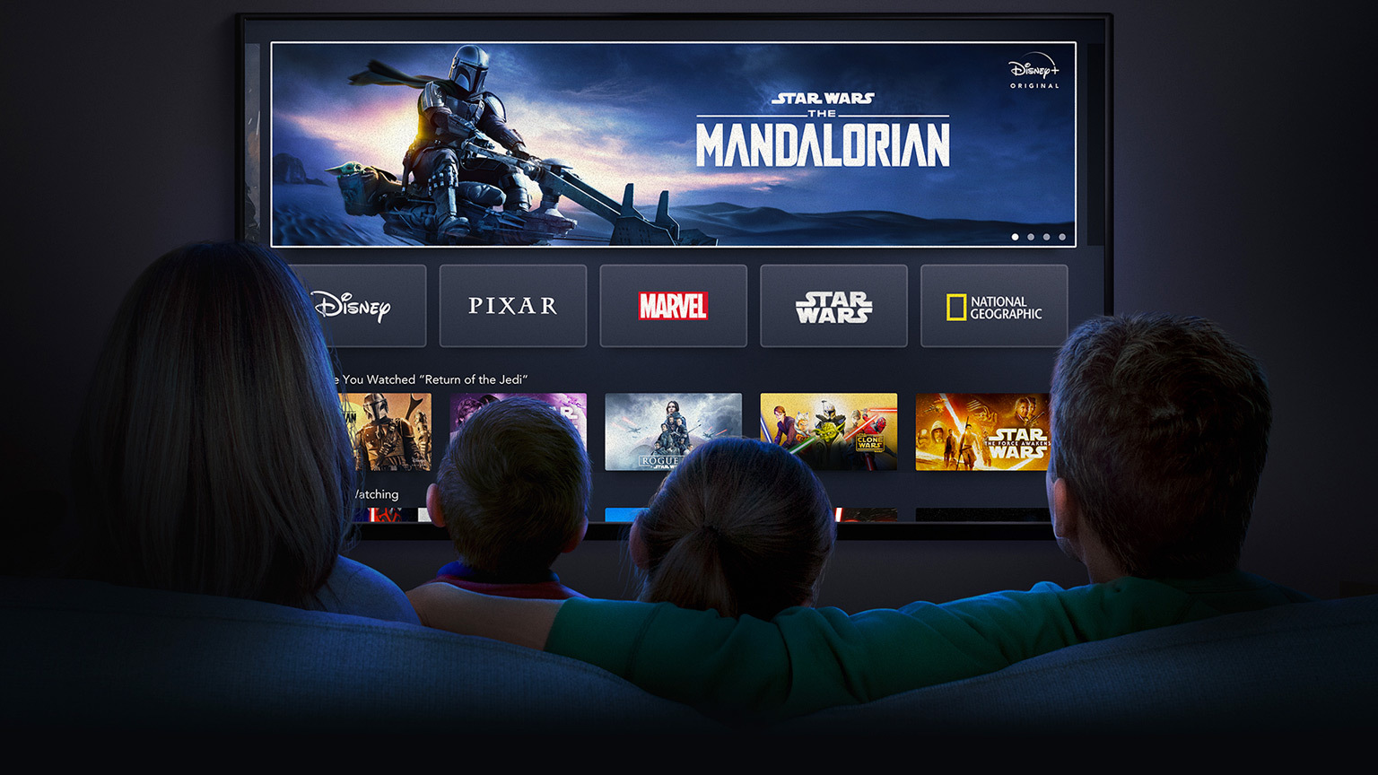 Family watching Disney Plus Family watching Disney Plus