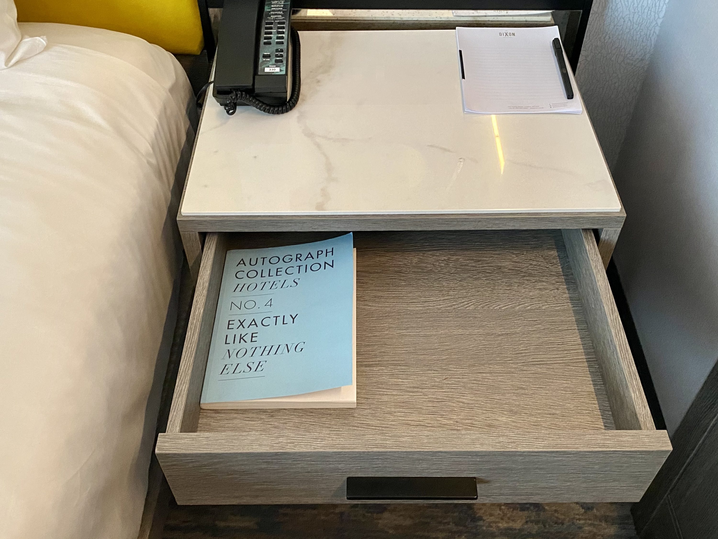 The Dixon London Autograph Collection bedroom nighstand drawer