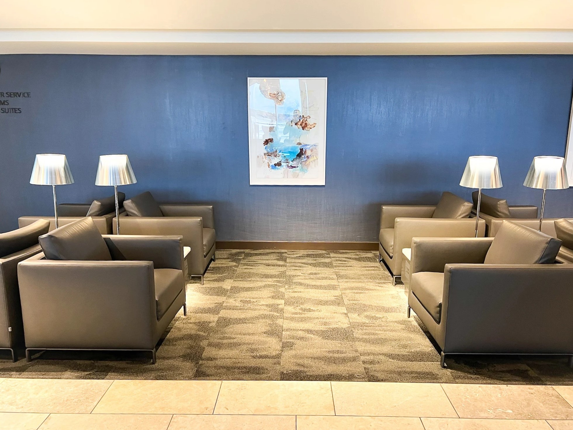 United Polaris Lounge Houston IAH arm chairs