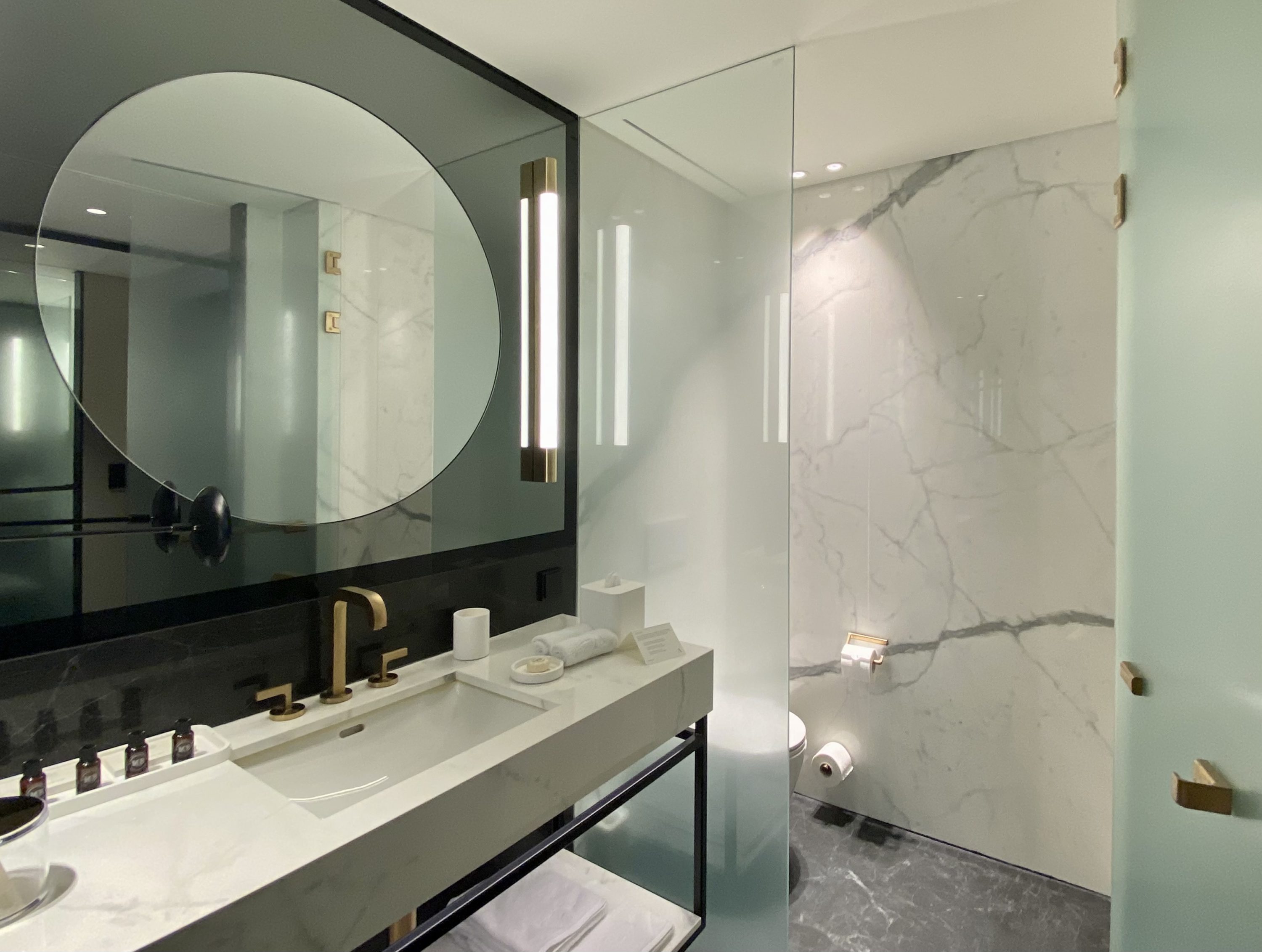 Academias Hotel bathroom sink and toilet room