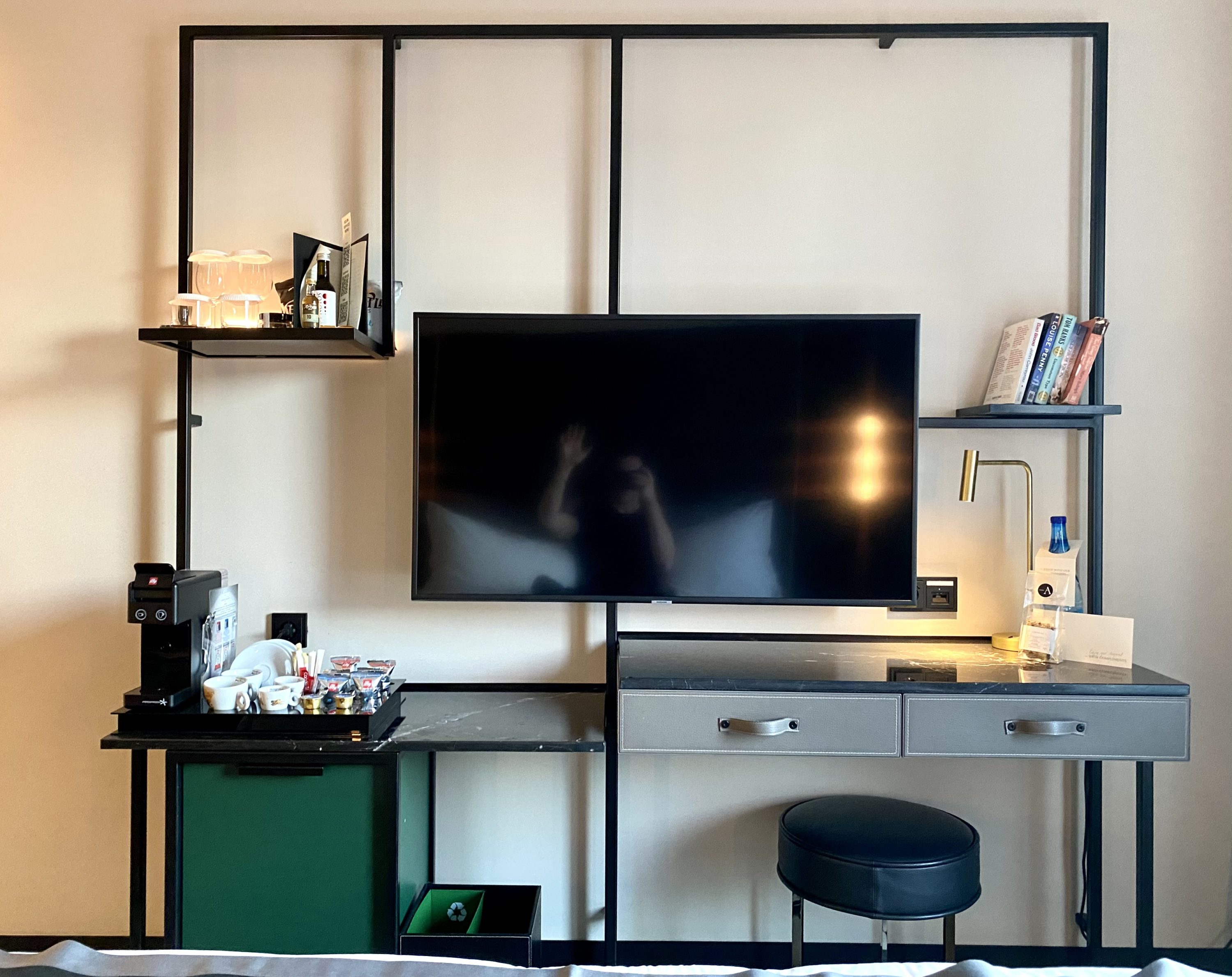 Academias Hotel bedroom tv desk and storage