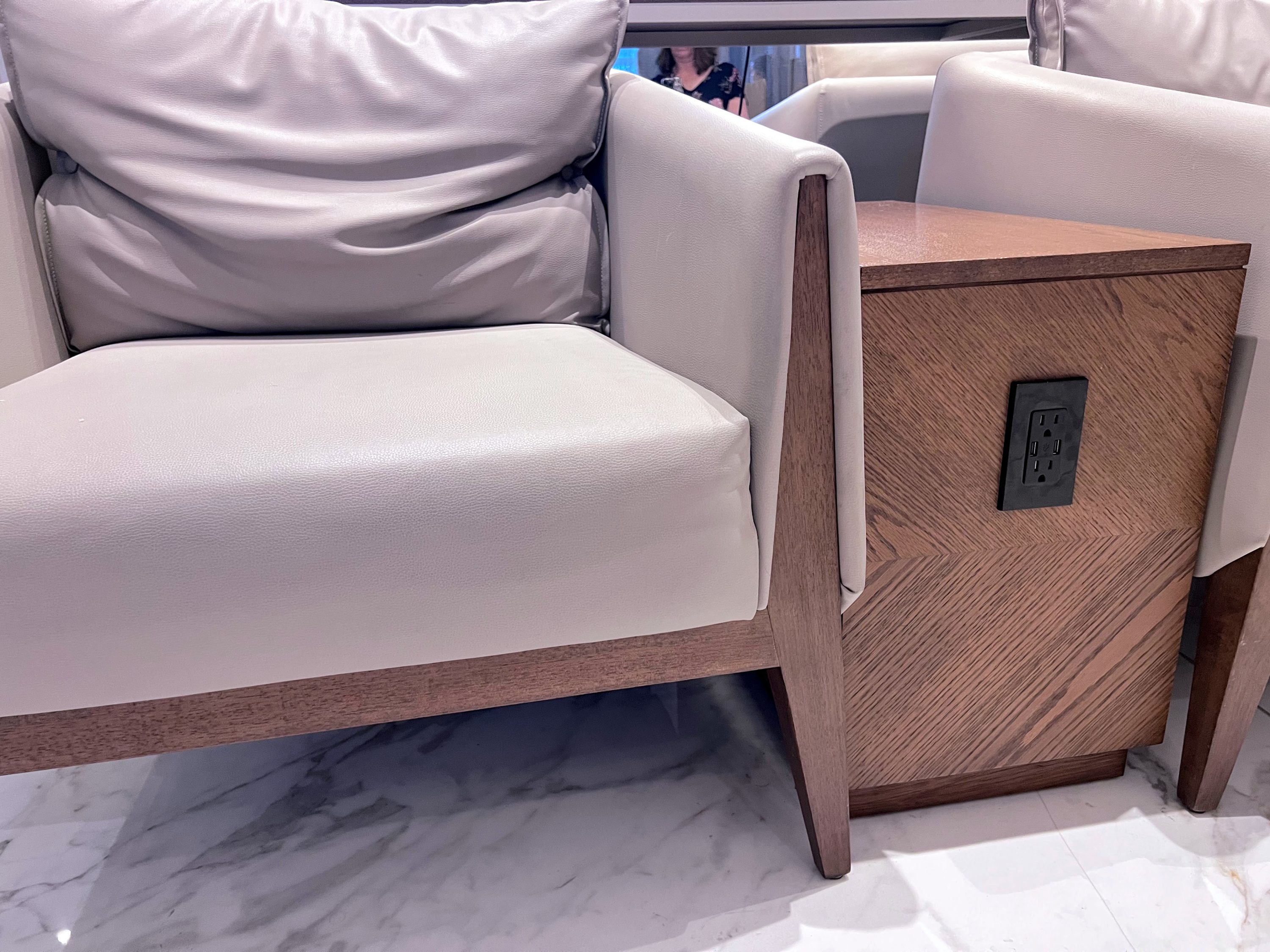Seating area plugs at Aeropuertos VIP Club lounge