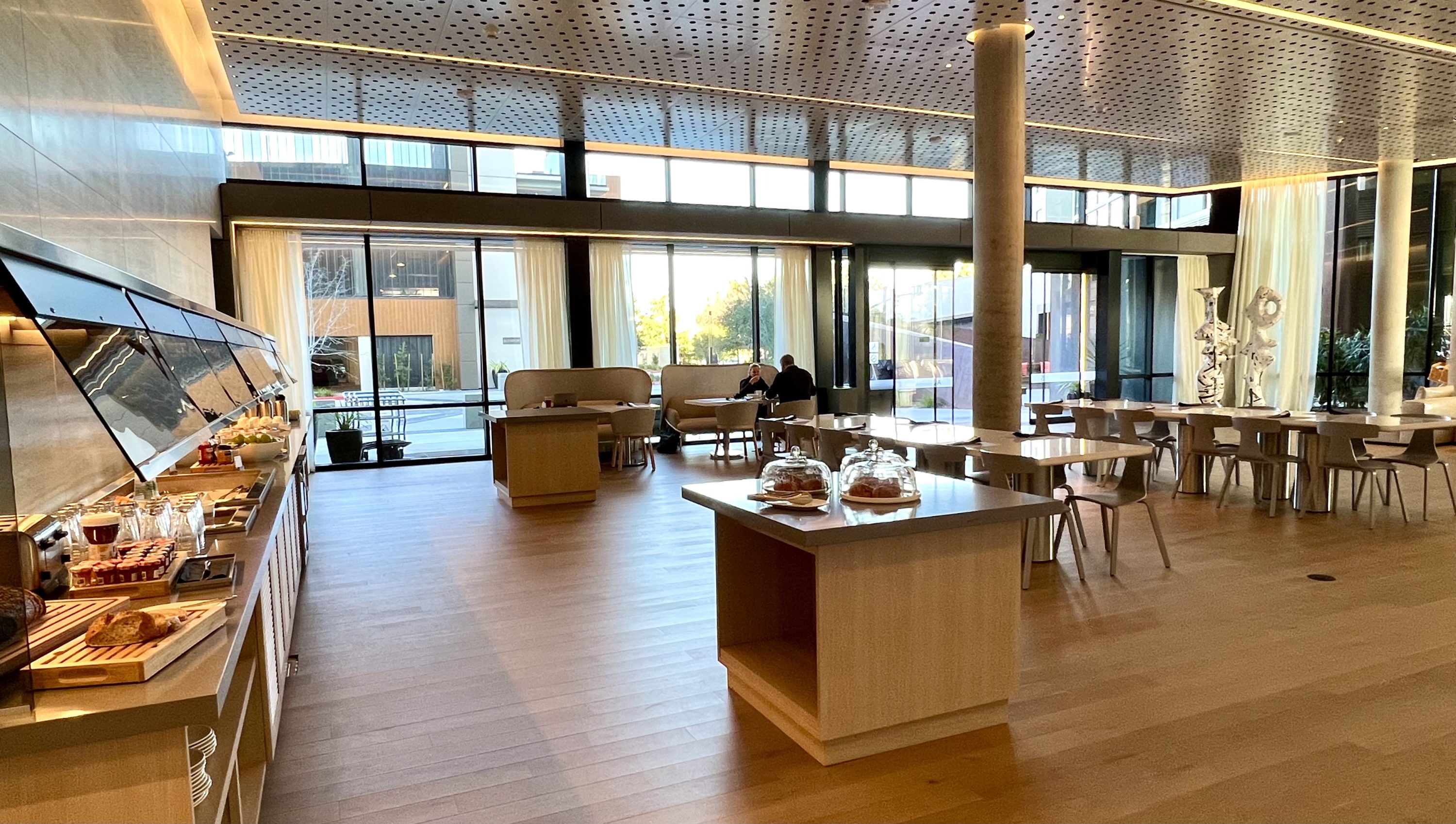 TETRA Hotel Autograph Collection breakfast buffet and dining area