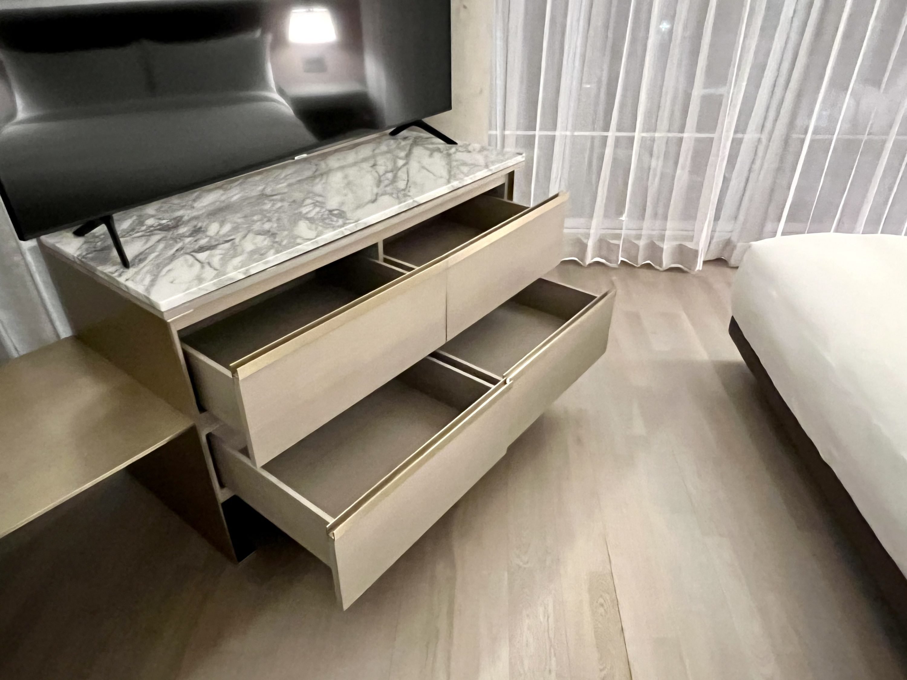 TETRA Hotel Autograph Collection suite bedroom storage