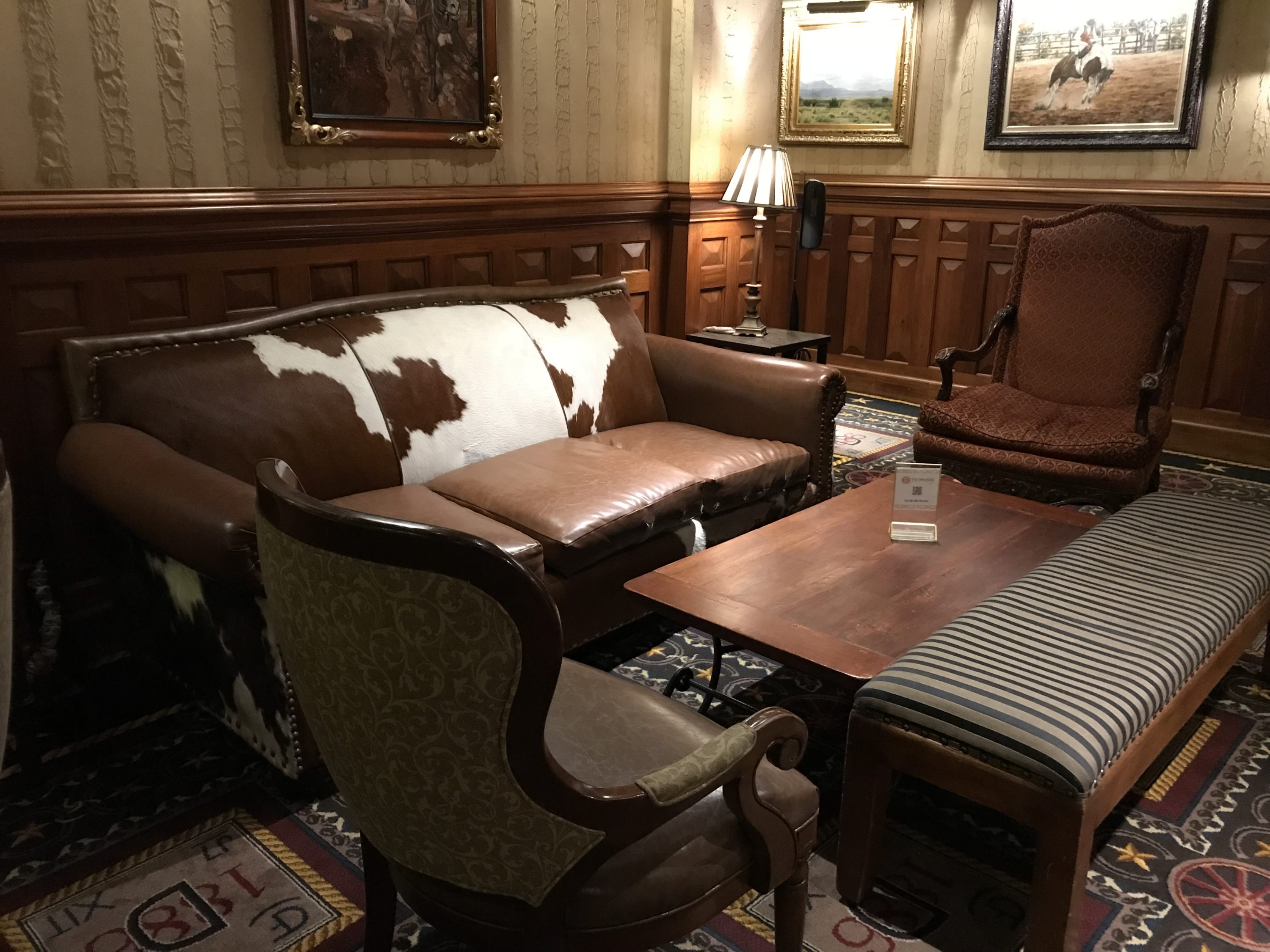 Cowhide seating at The Driskill Bar