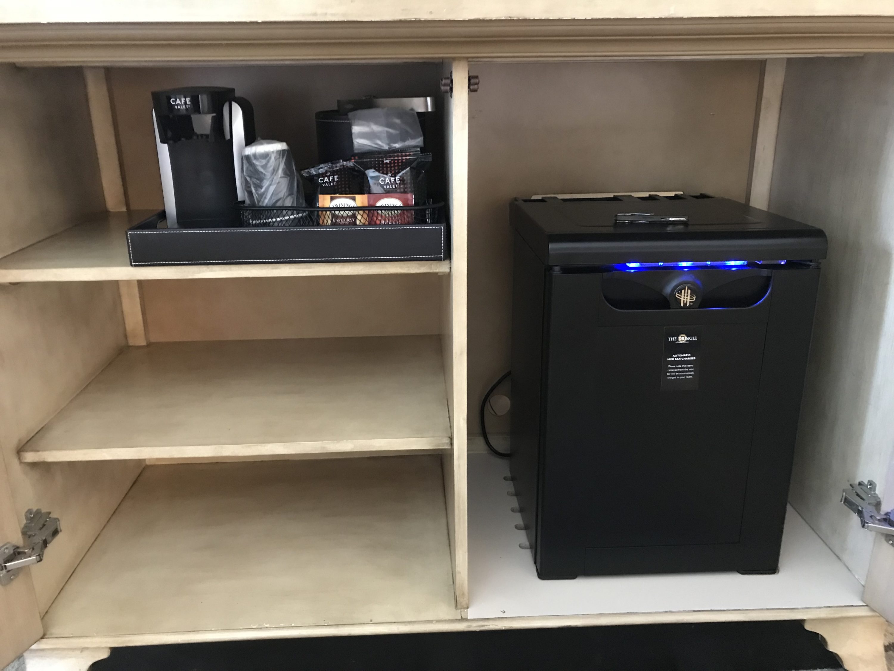 Coffee and tea maker, minibar inside the dresser