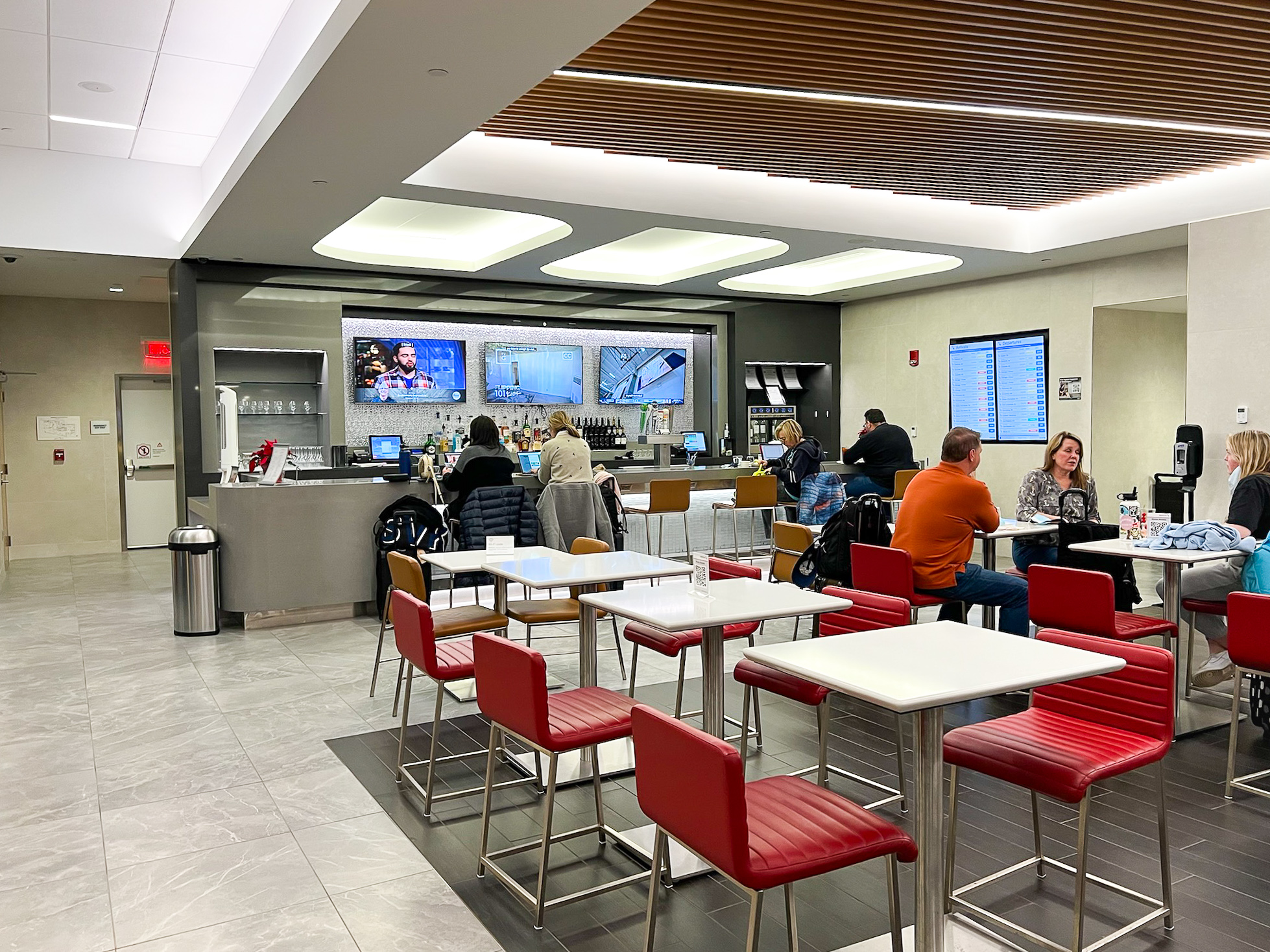 Bar seating at the Admirals Club at Boston Logan International Airport