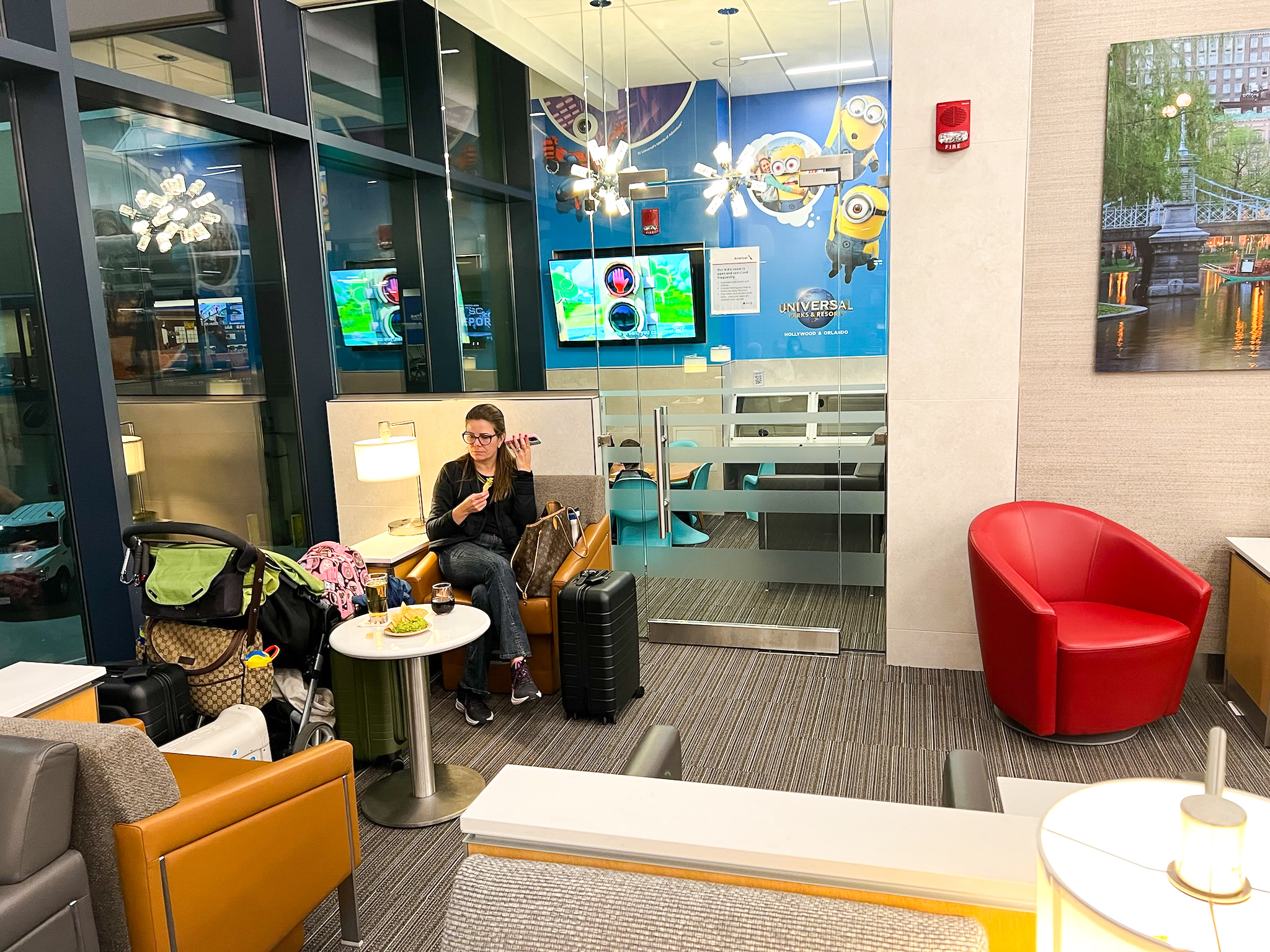 Chairs outside kids room at the Admirals Club at Boston Logan International Airport