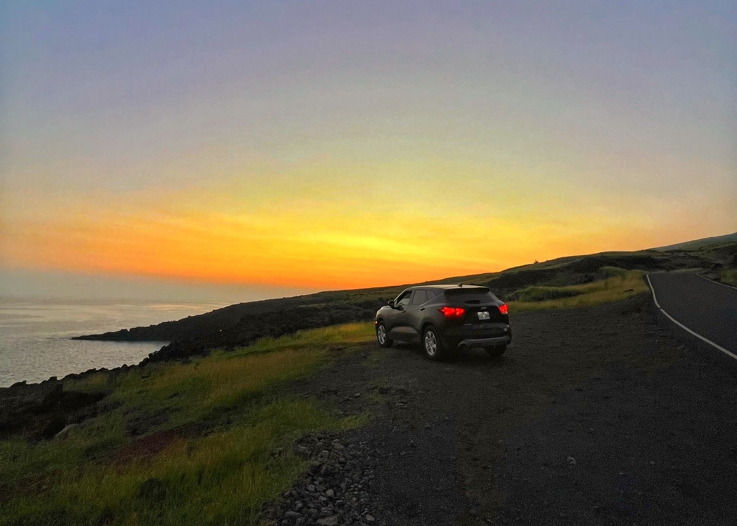 Hertz rental car on The Road to Hana in Maui Hawaii at sunset