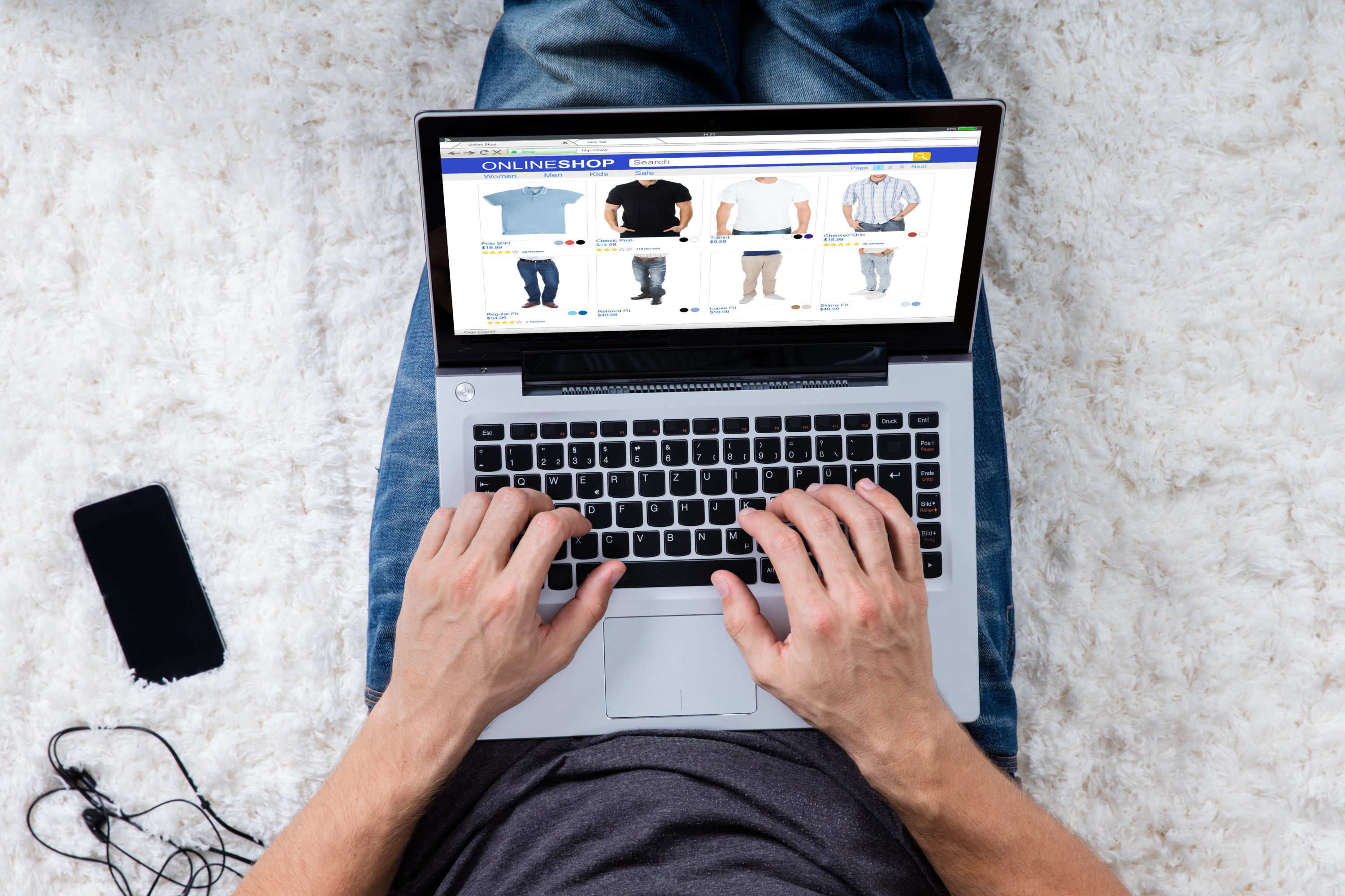 Man shopping on laptop