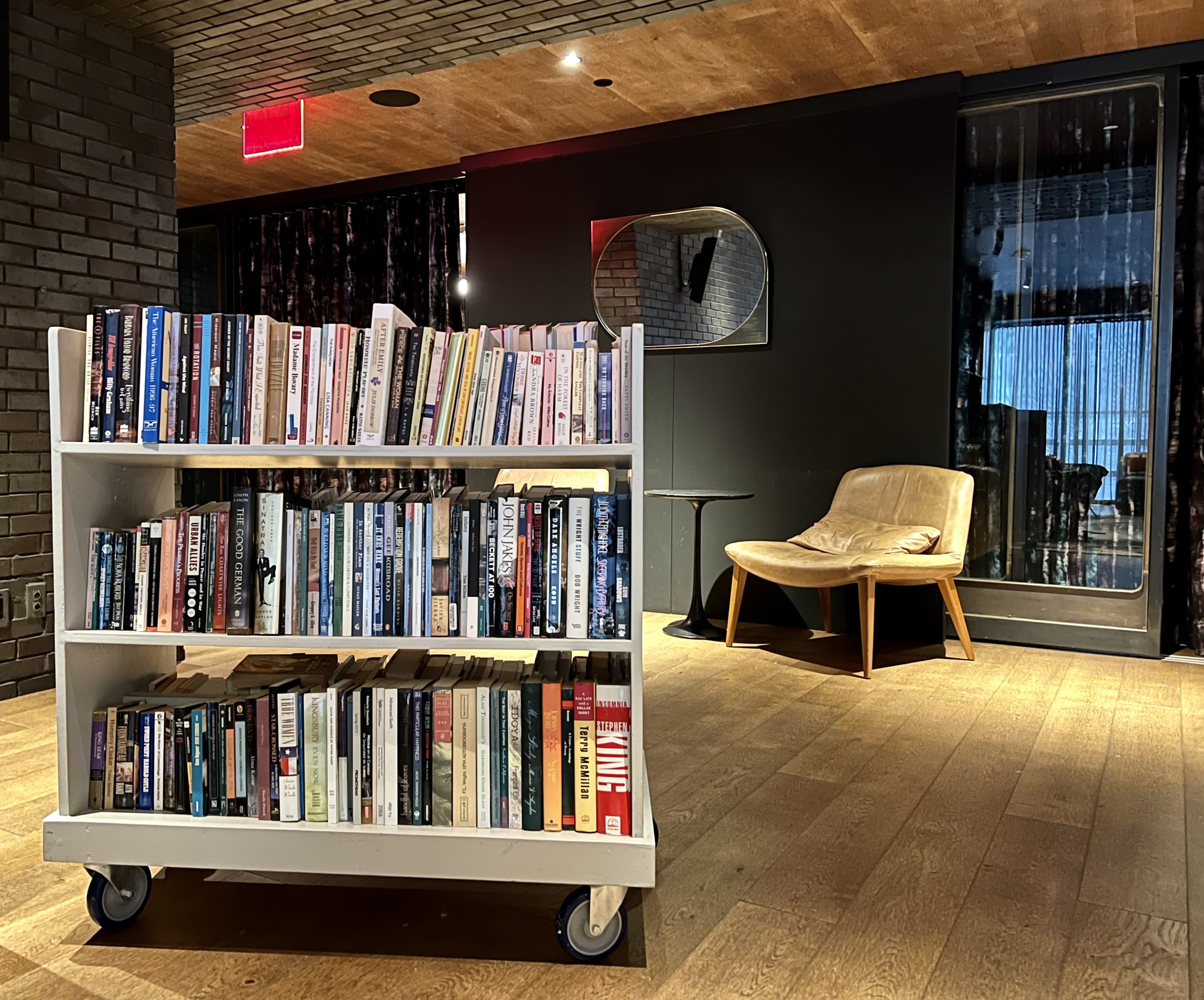 Moxy East Village Alphabet Bar Café book trolley