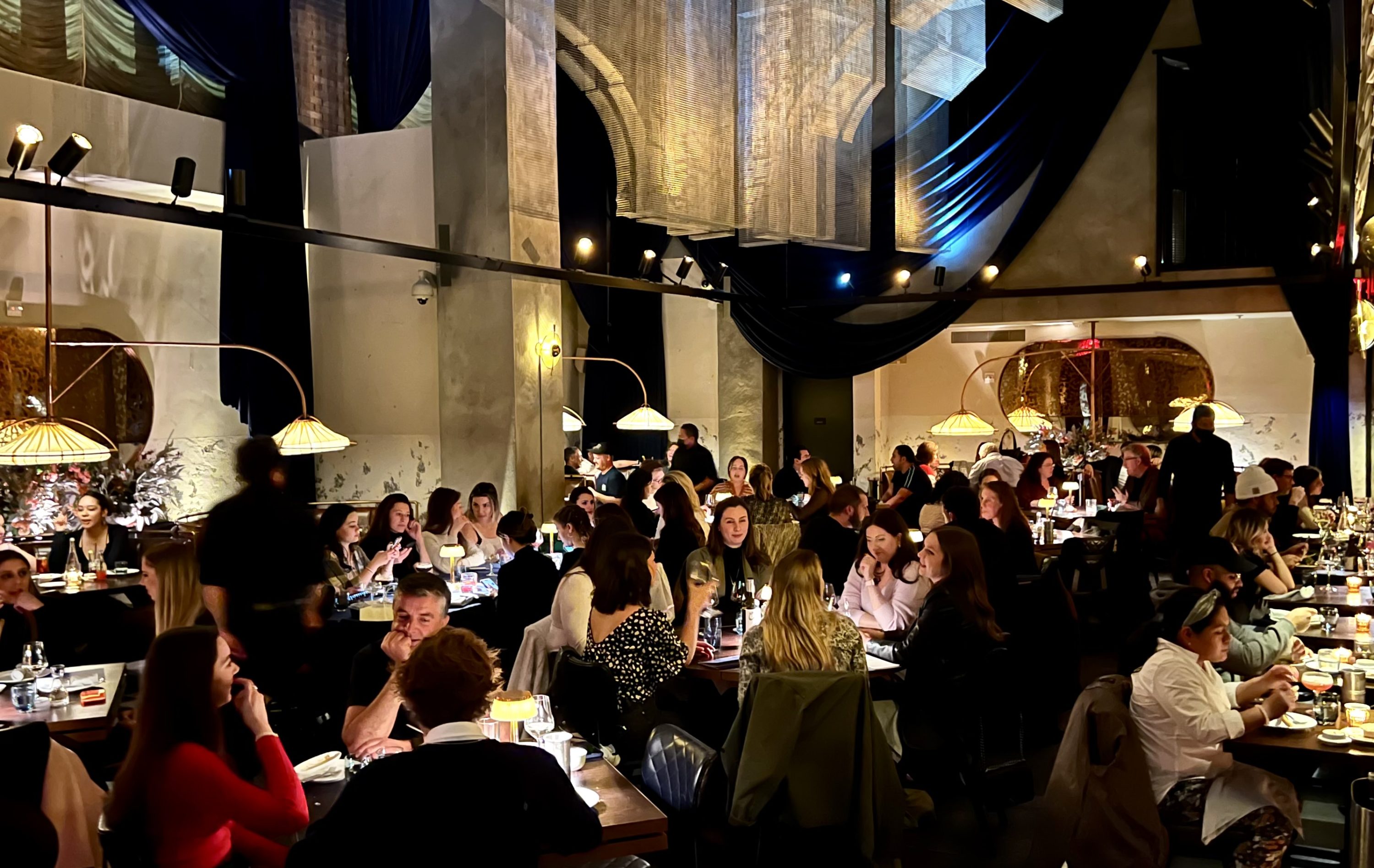 Moxy East Village Cathédrale full of diners